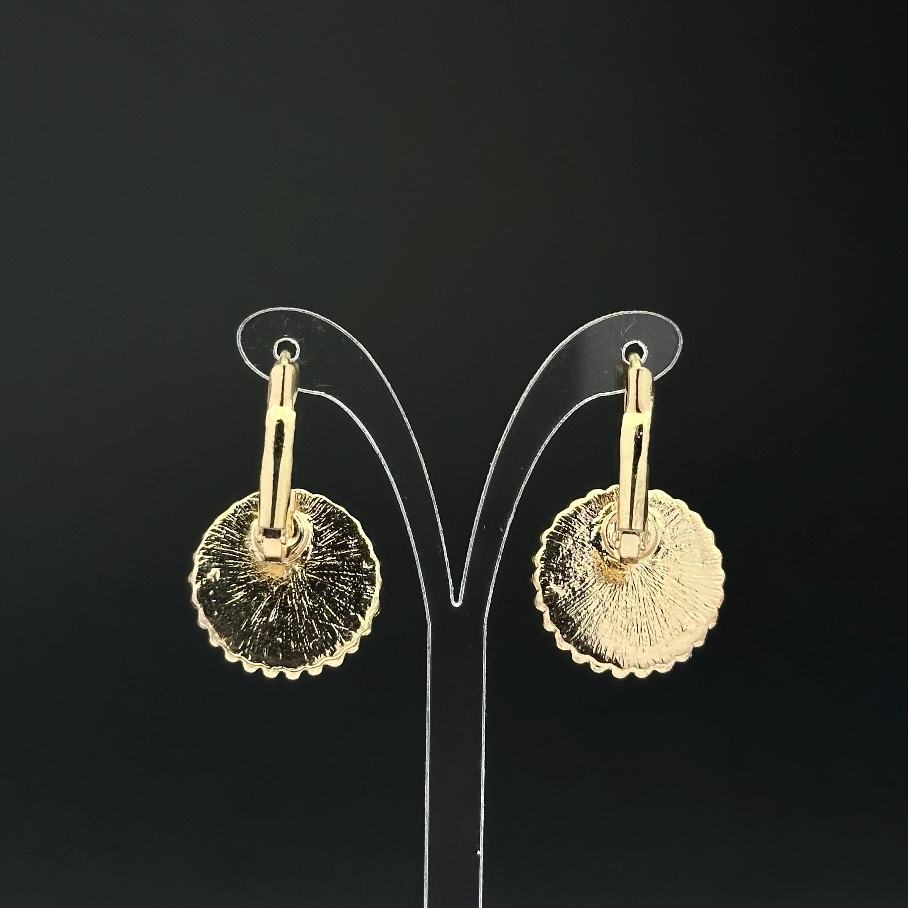 Vintage gold tone and brown plastic crystal openwork earrings