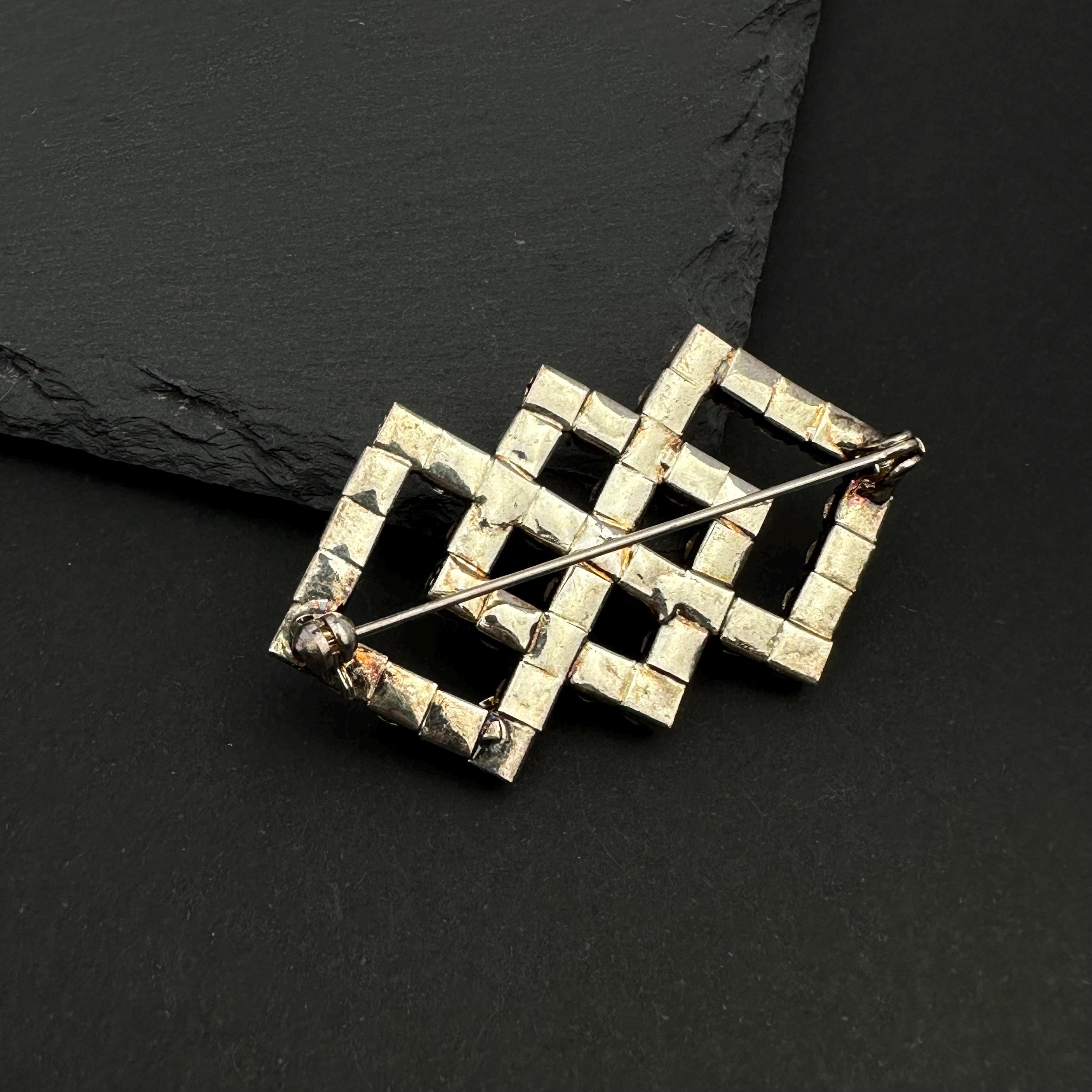 Vintage silver tone and rhinestone art deco brooch