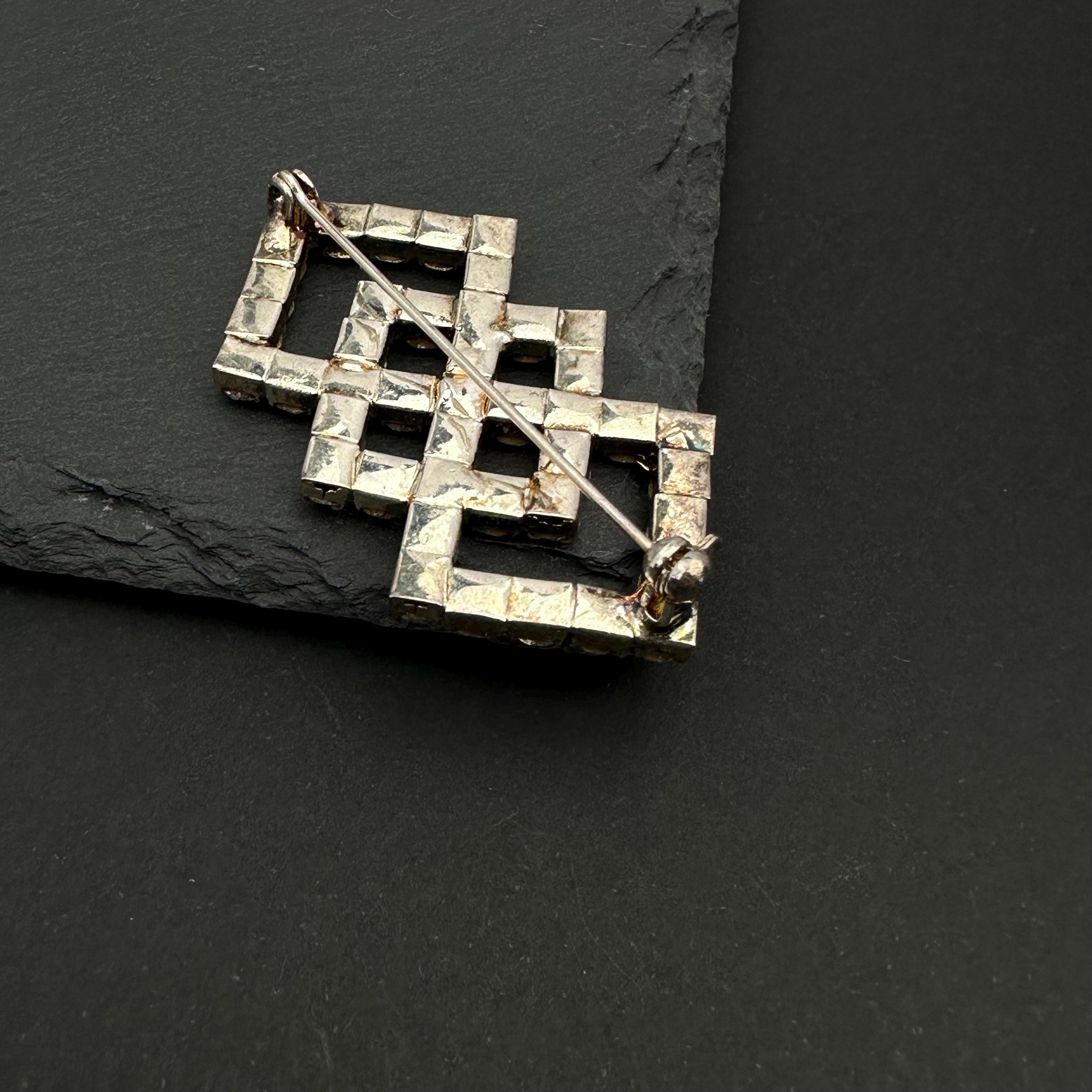 Vintage silver tone and rhinestone art deco brooch