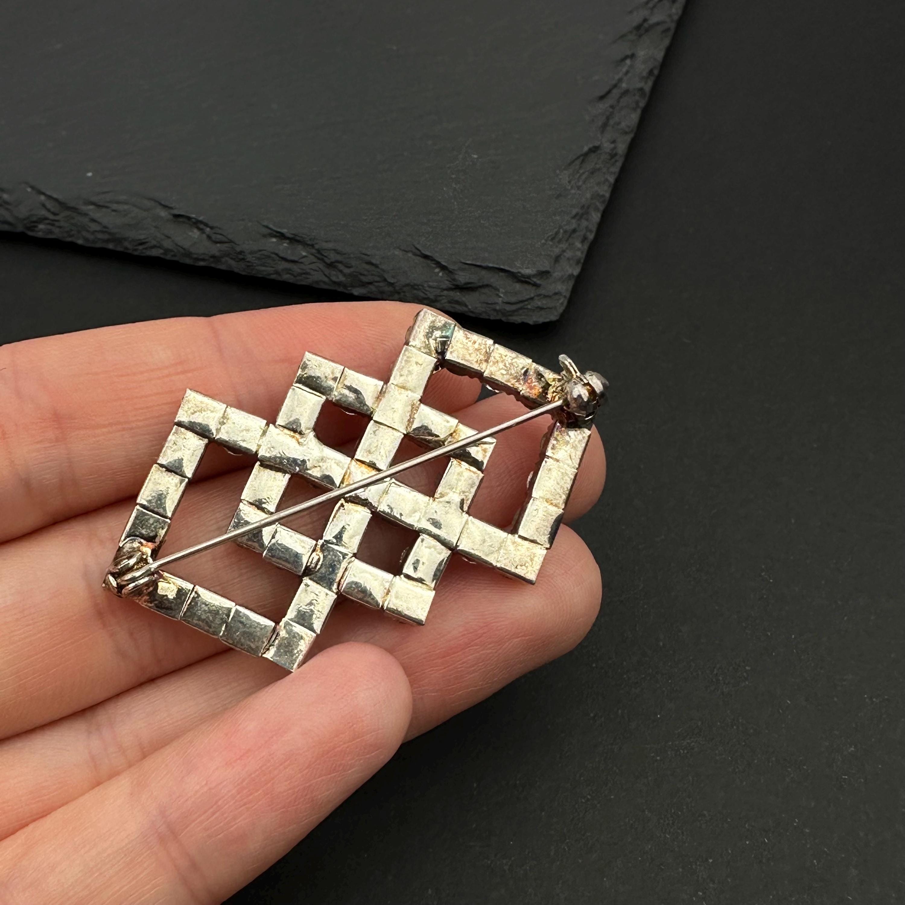 Vintage silver tone and rhinestone art deco brooch