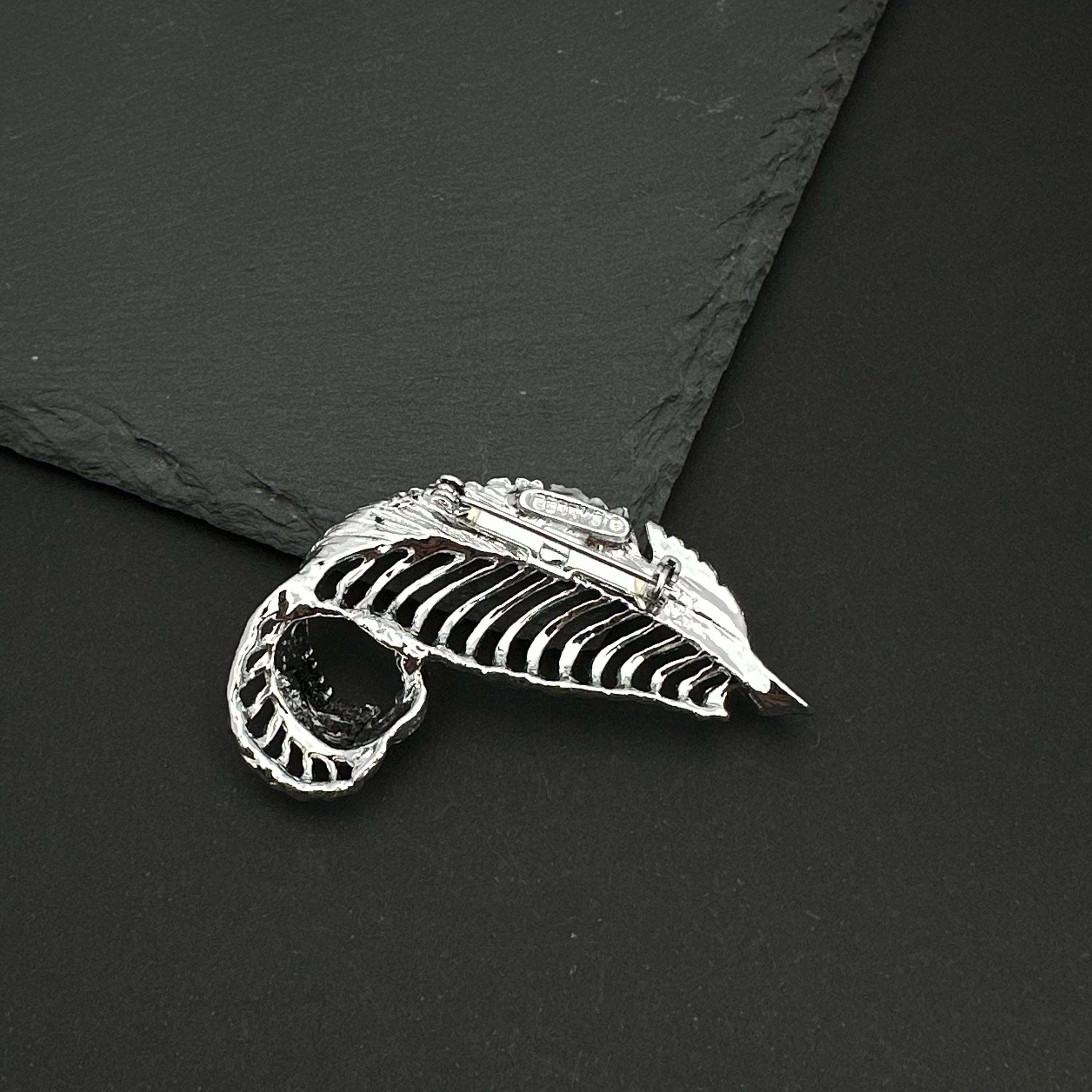 Vintage Gerry's silver tone feather brooch