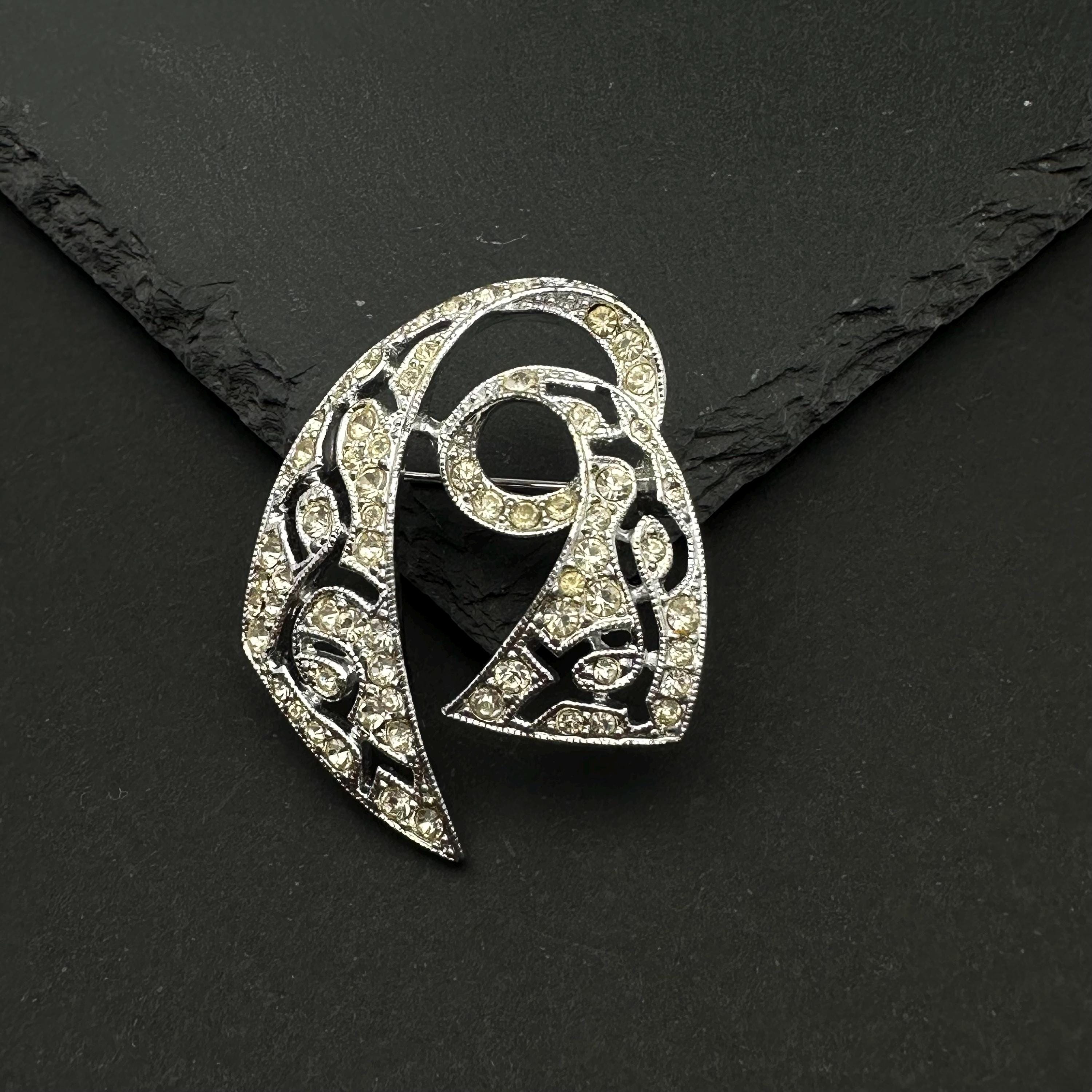 Vintage EMMONS silver tone and rhinestone brooch