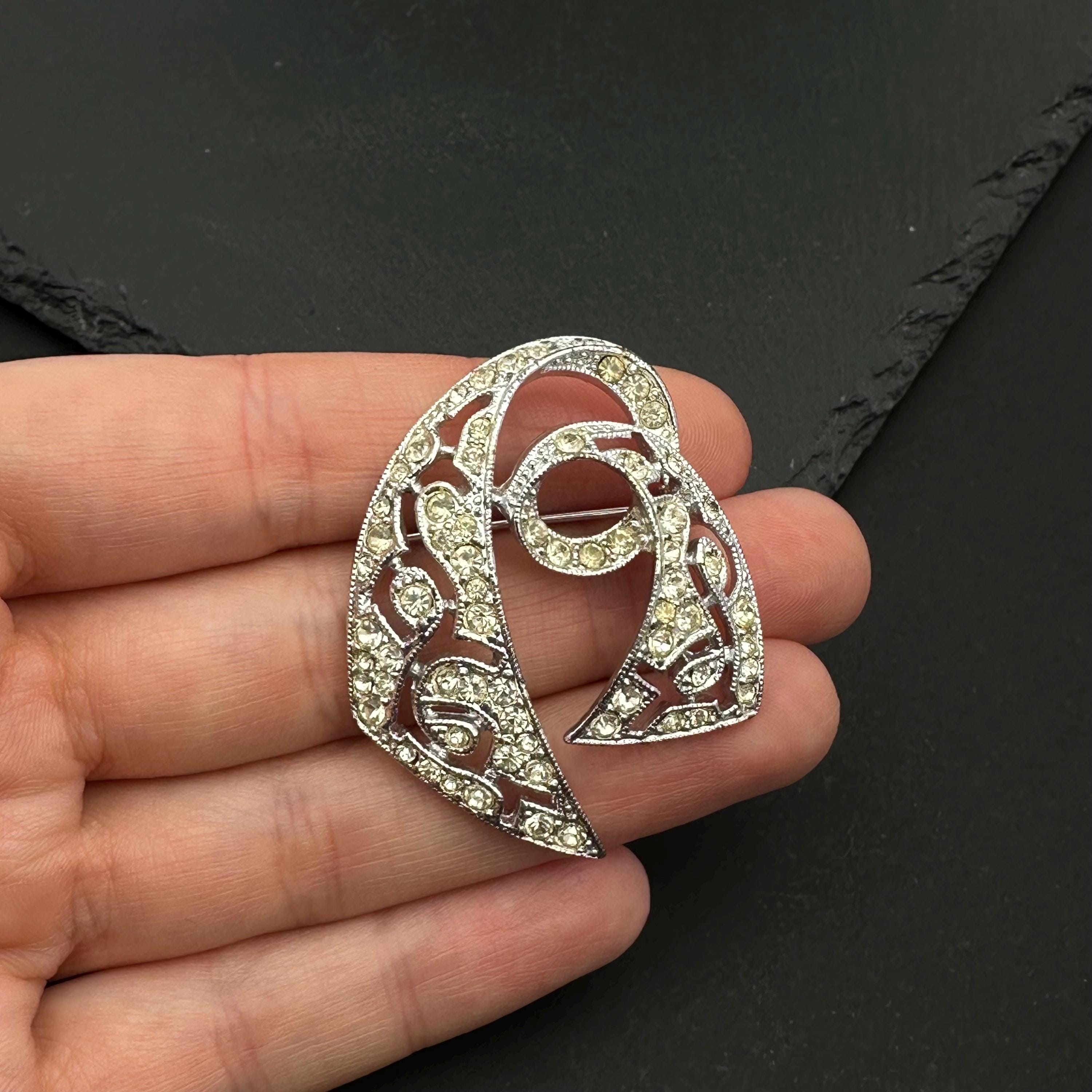 Vintage EMMONS silver tone and rhinestone brooch