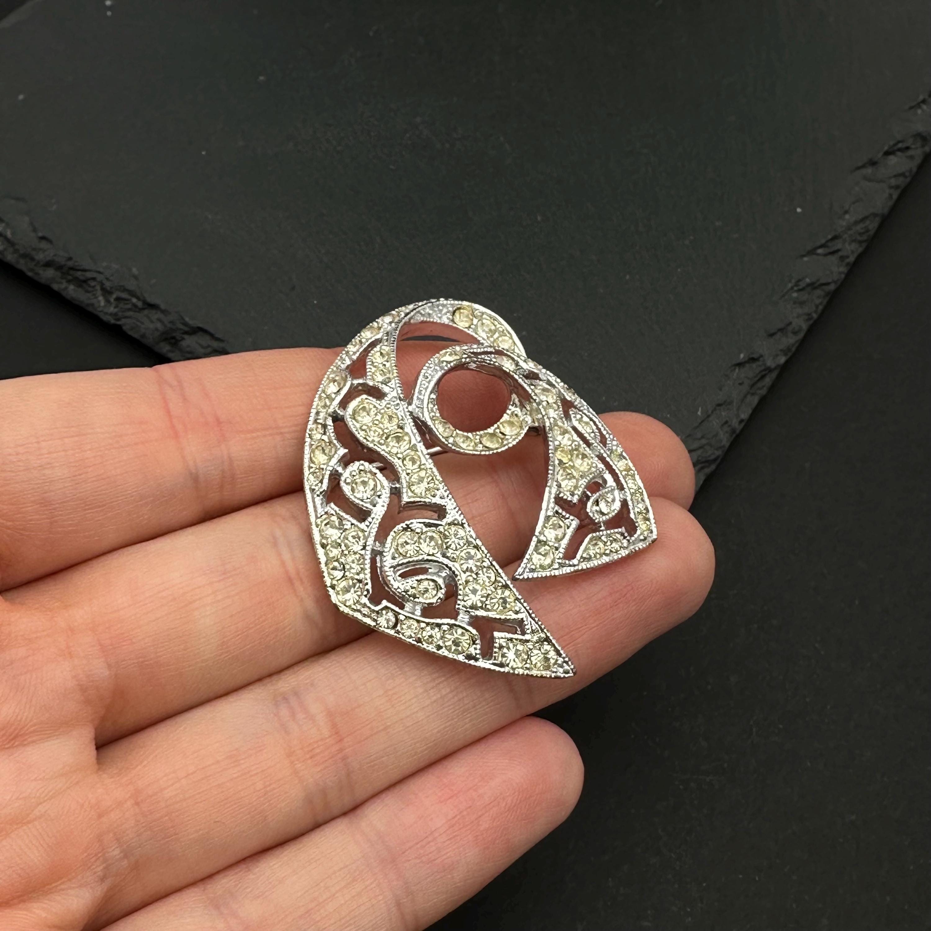 Vintage EMMONS silver tone and rhinestone brooch