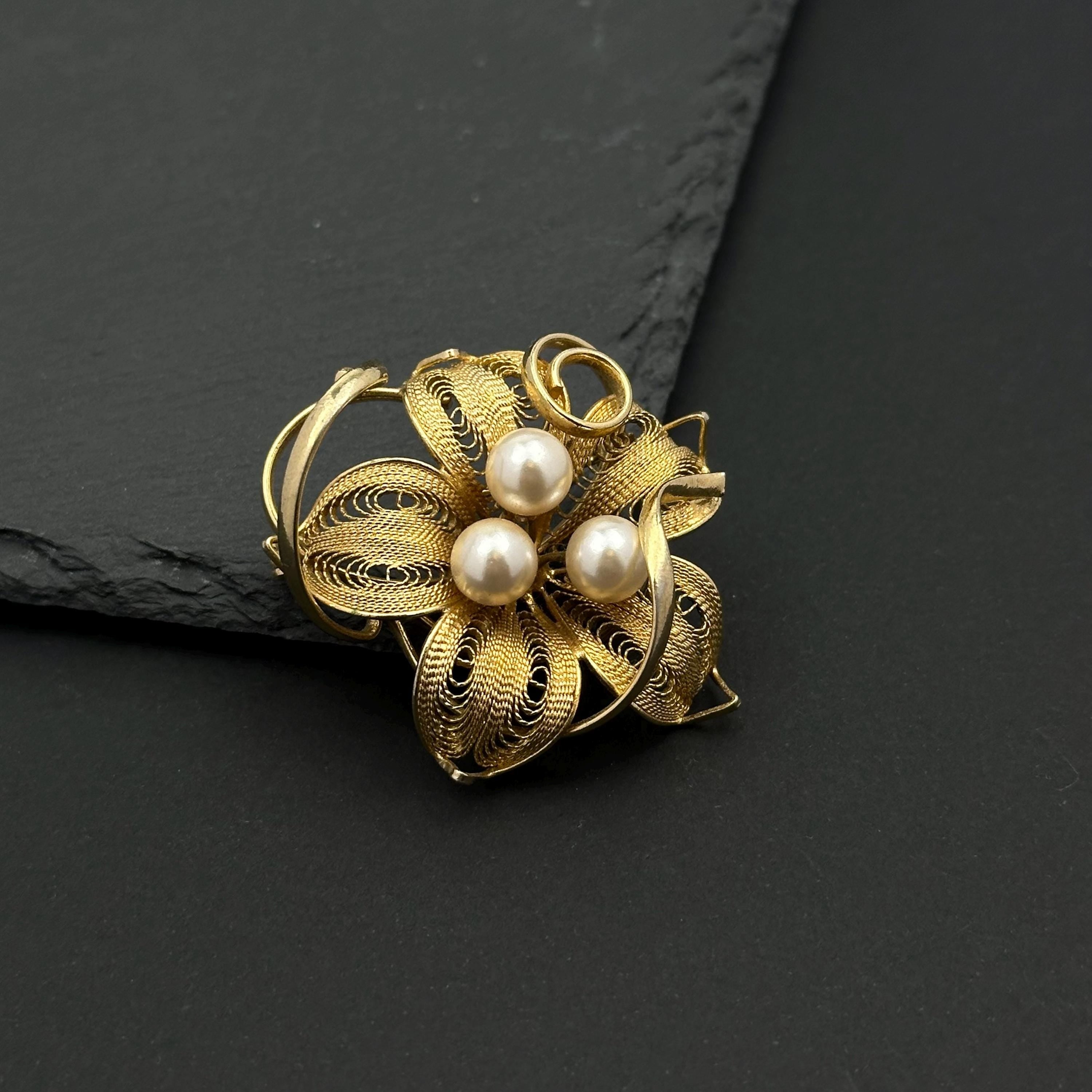 Vintage gold tone and pearl flower filigree brooch