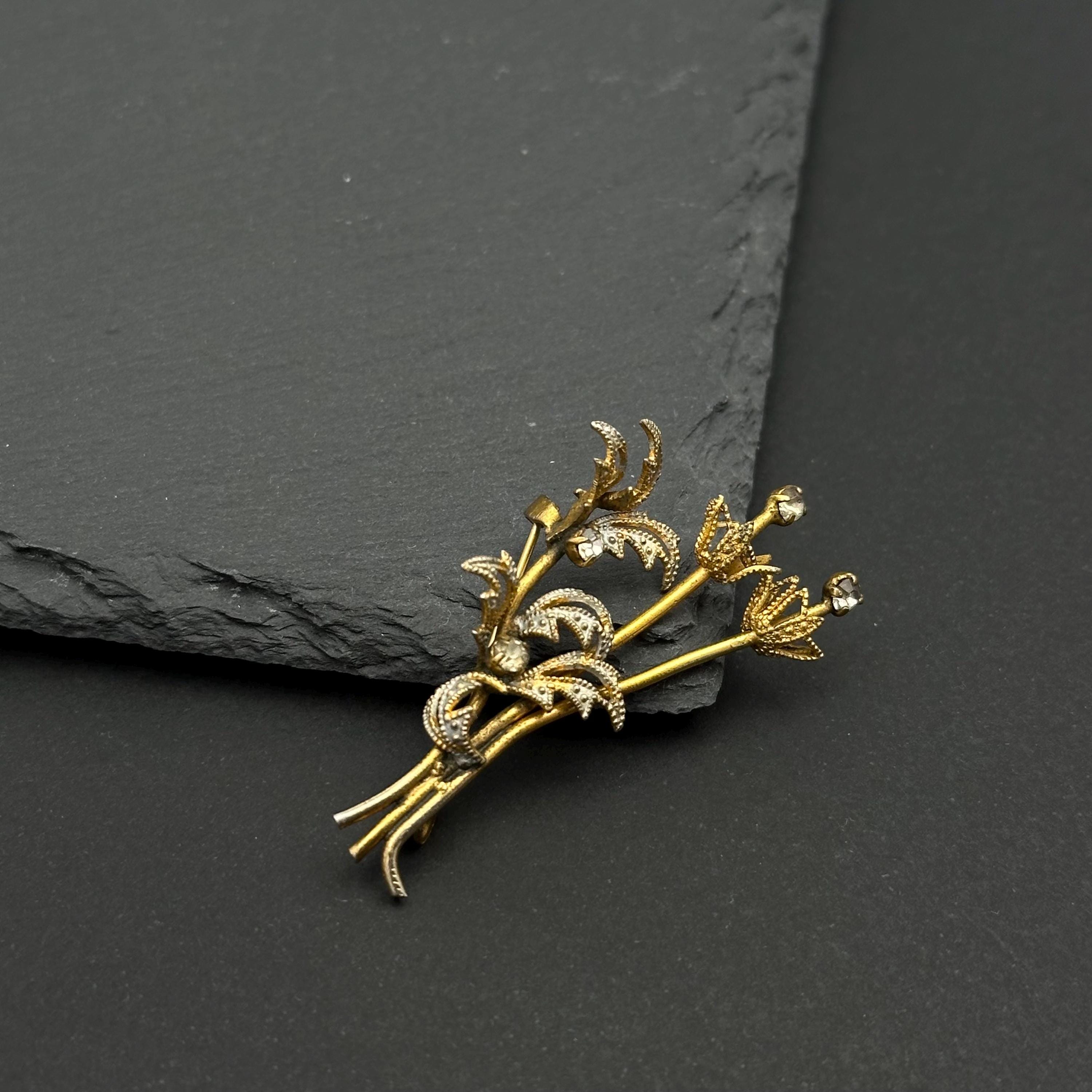 Vintage gold tone and crystal bouquet brooch