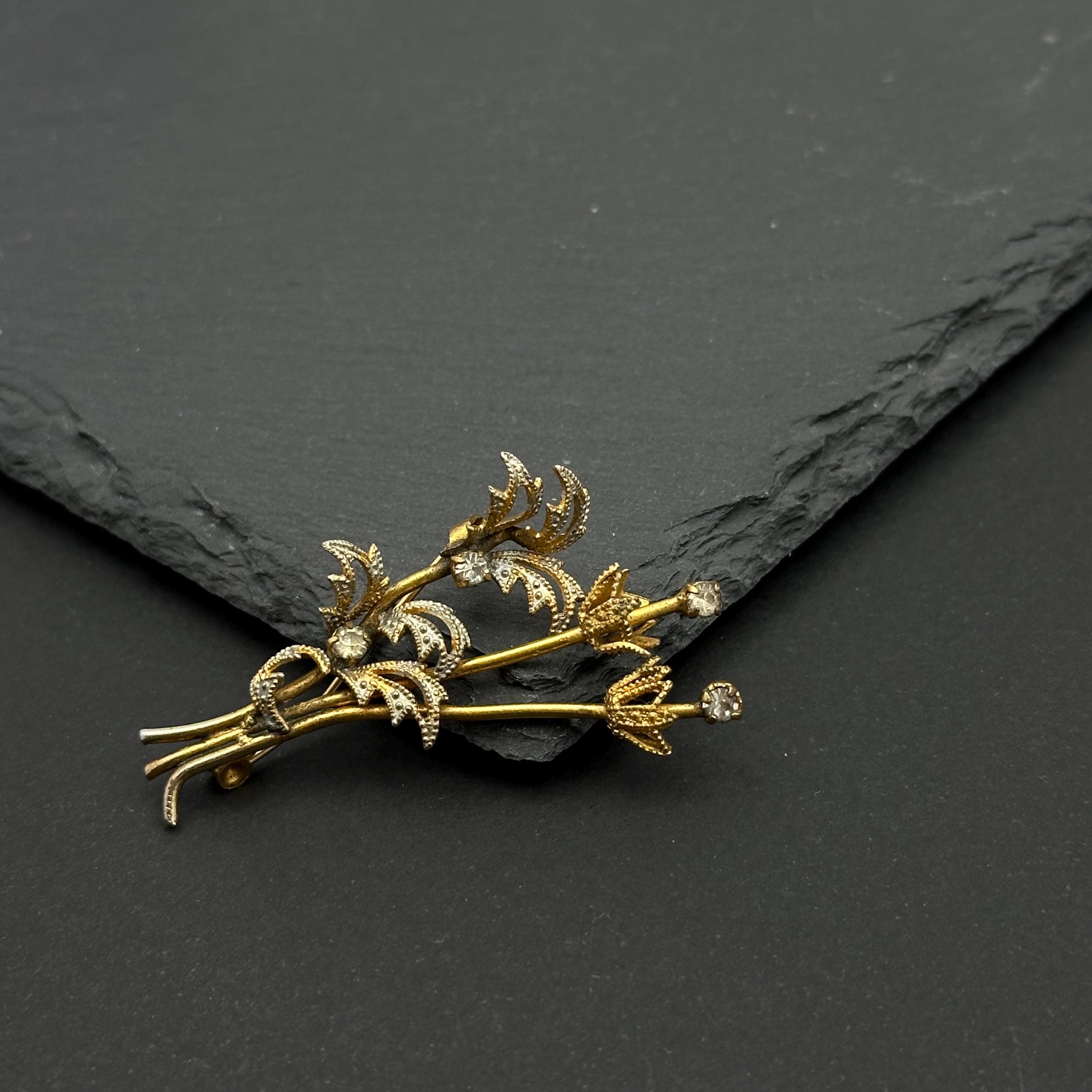 Vintage gold tone and crystal bouquet brooch