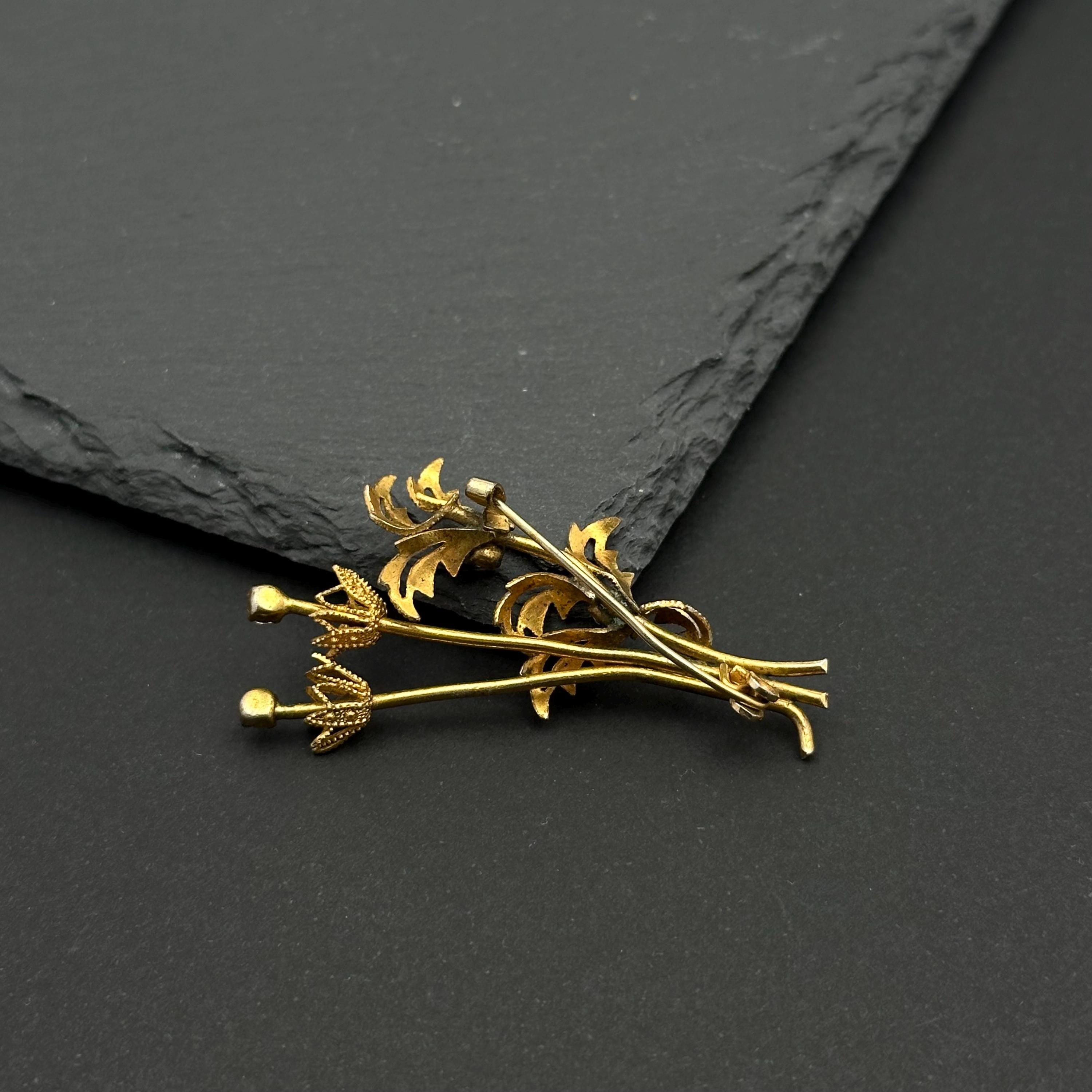 Vintage gold tone and crystal bouquet brooch