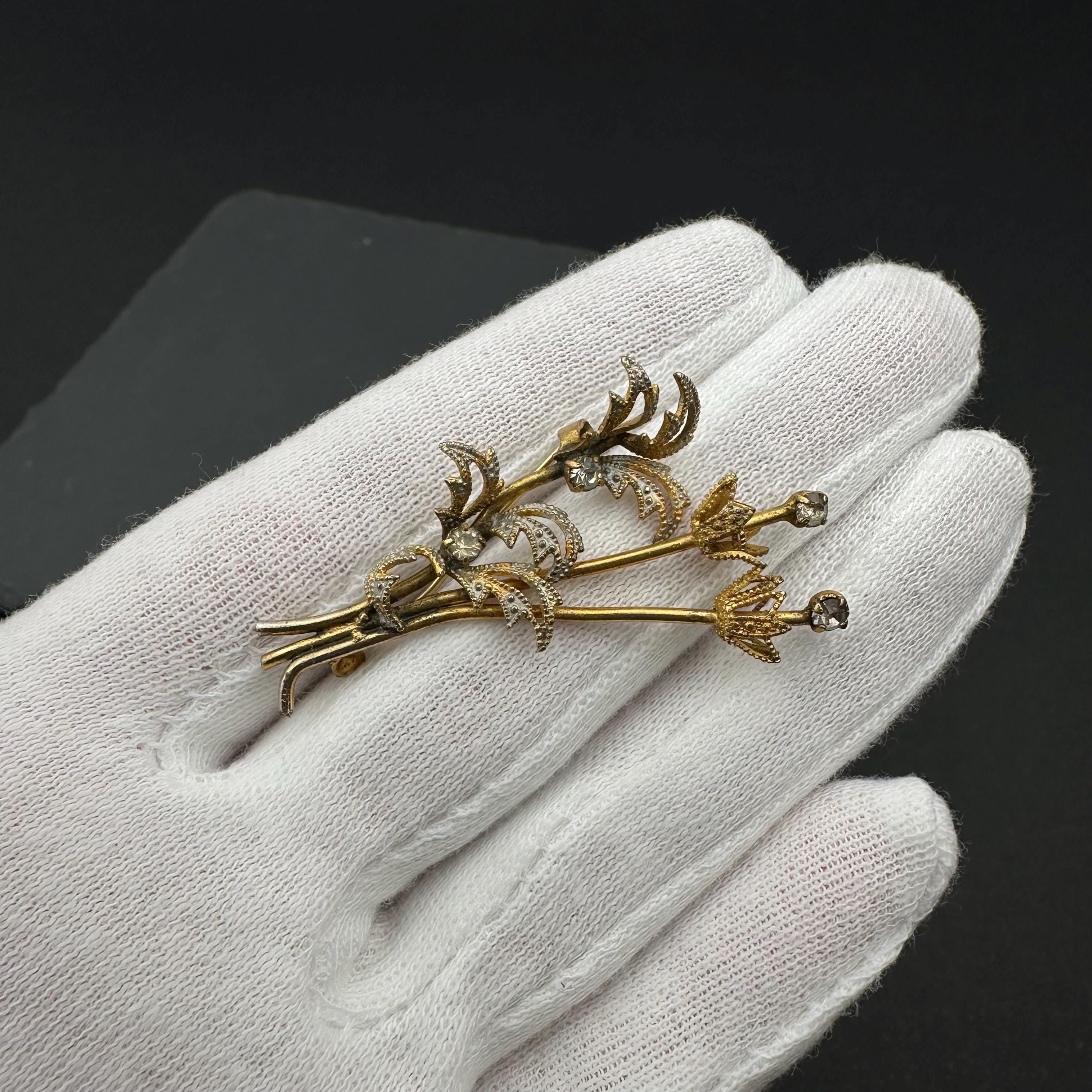 Vintage gold tone and crystal bouquet brooch