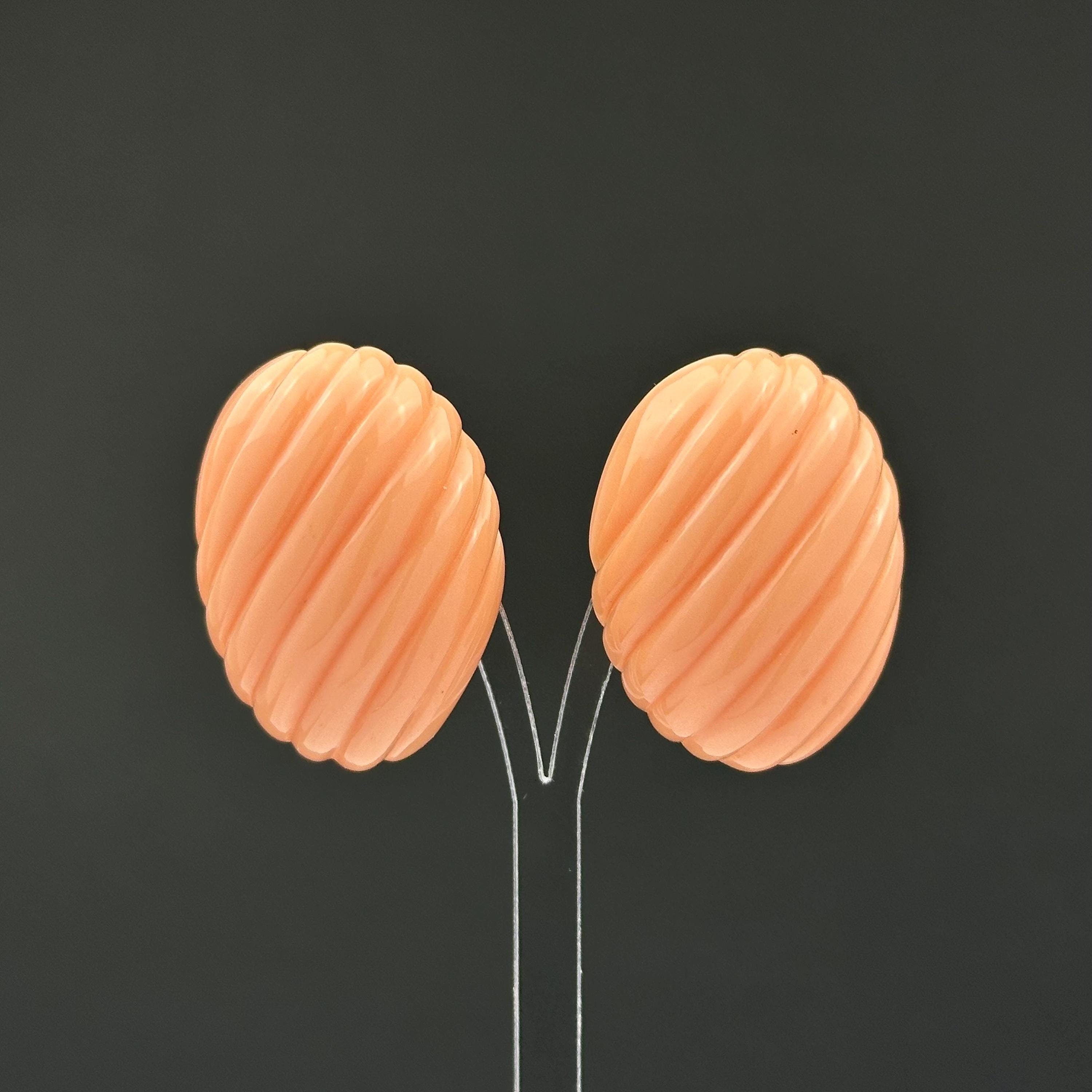 Vintage Trifari Peach Ribbed Plastic Clip On Earrings, 1980s