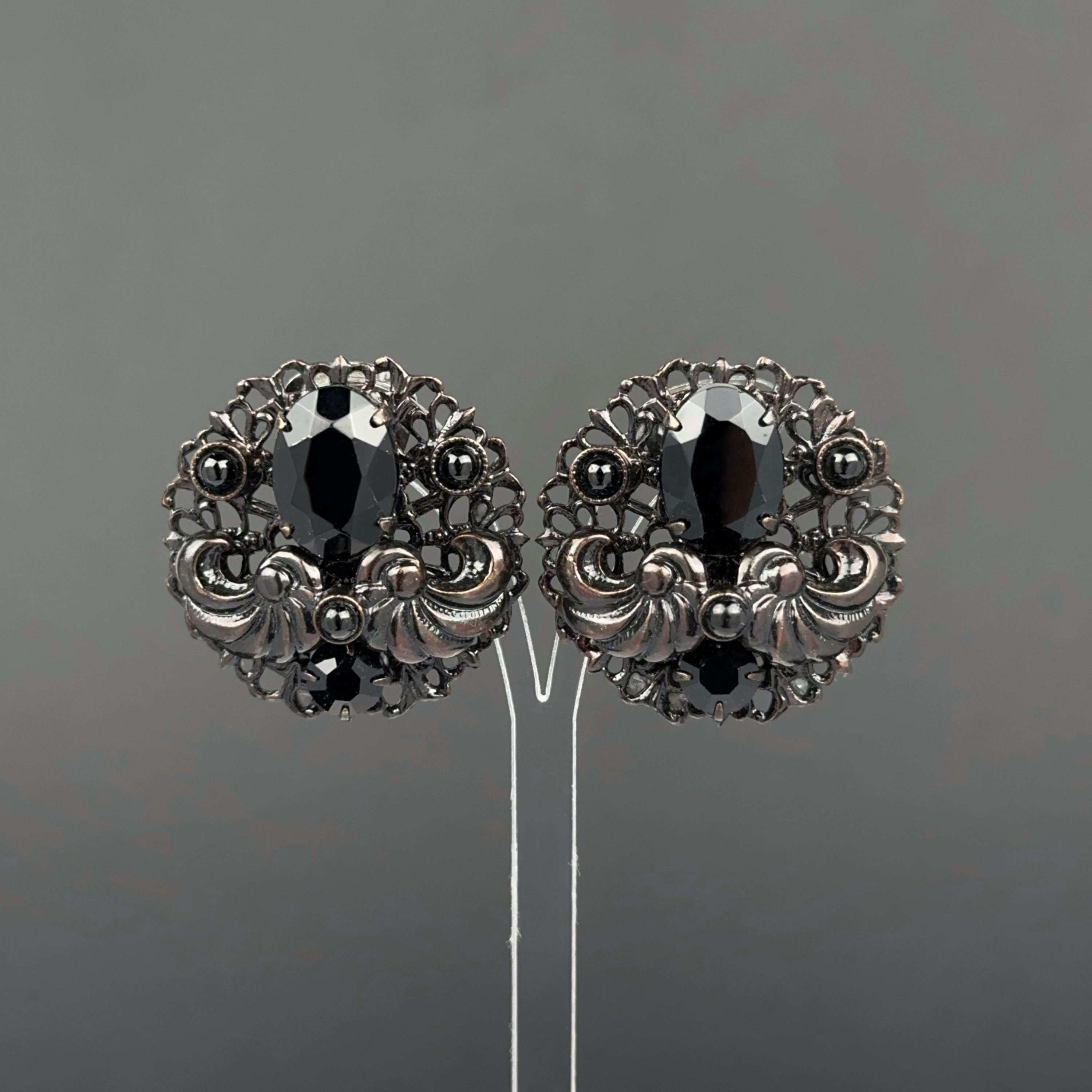 Vintage black filigree clip on earrings