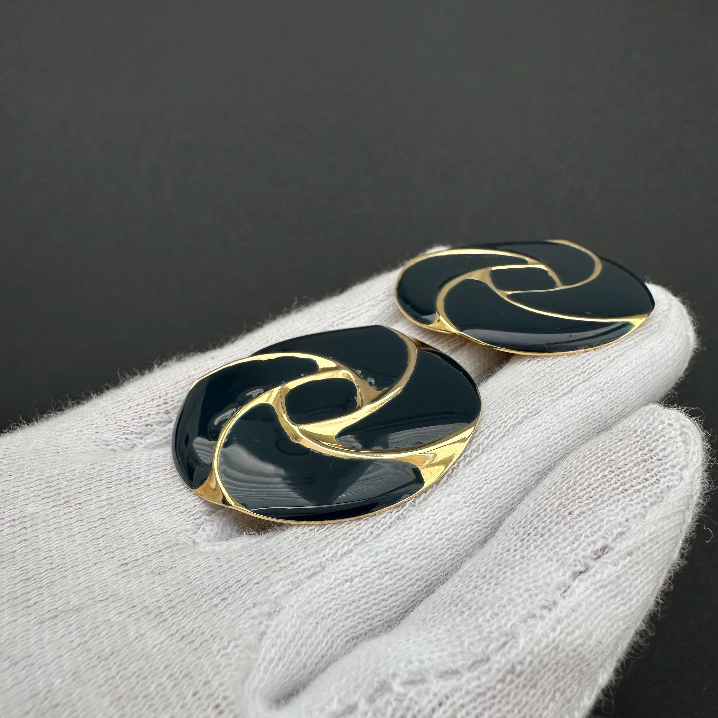 Vintage gold tone and navy blue enamel round clip on earrings