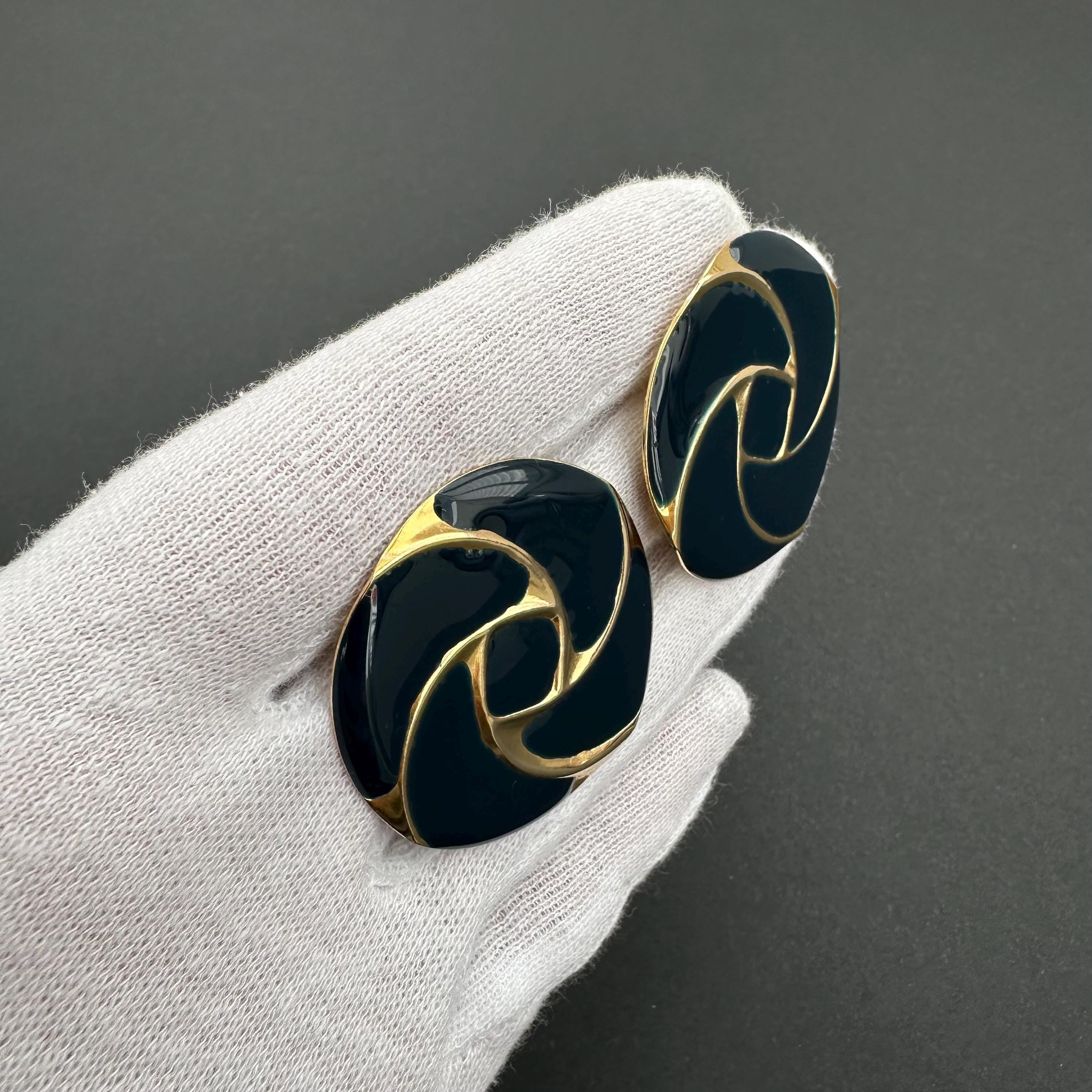 Vintage gold tone and navy blue enamel round clip on earrings