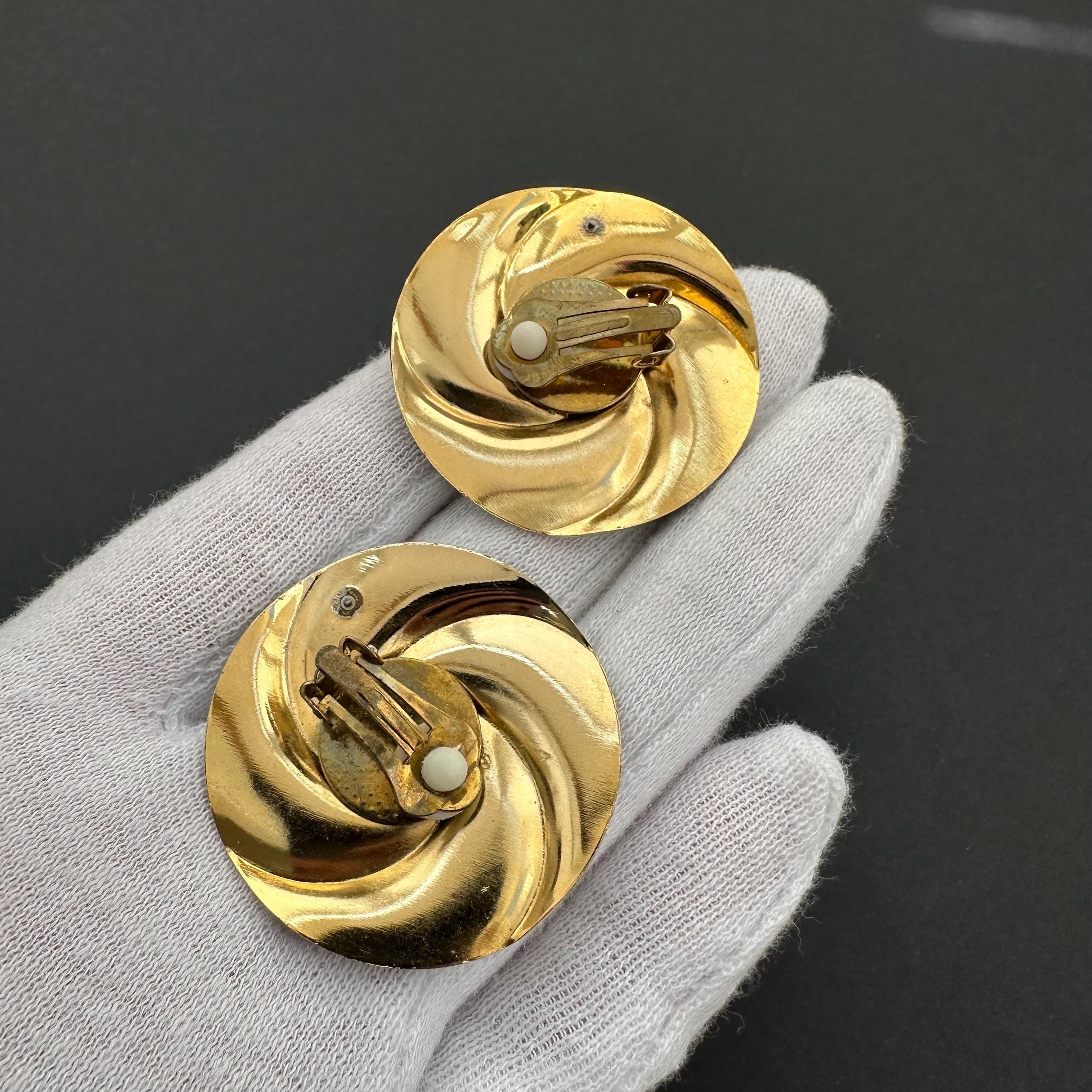 Vintage gold tone and navy blue enamel round clip on earrings