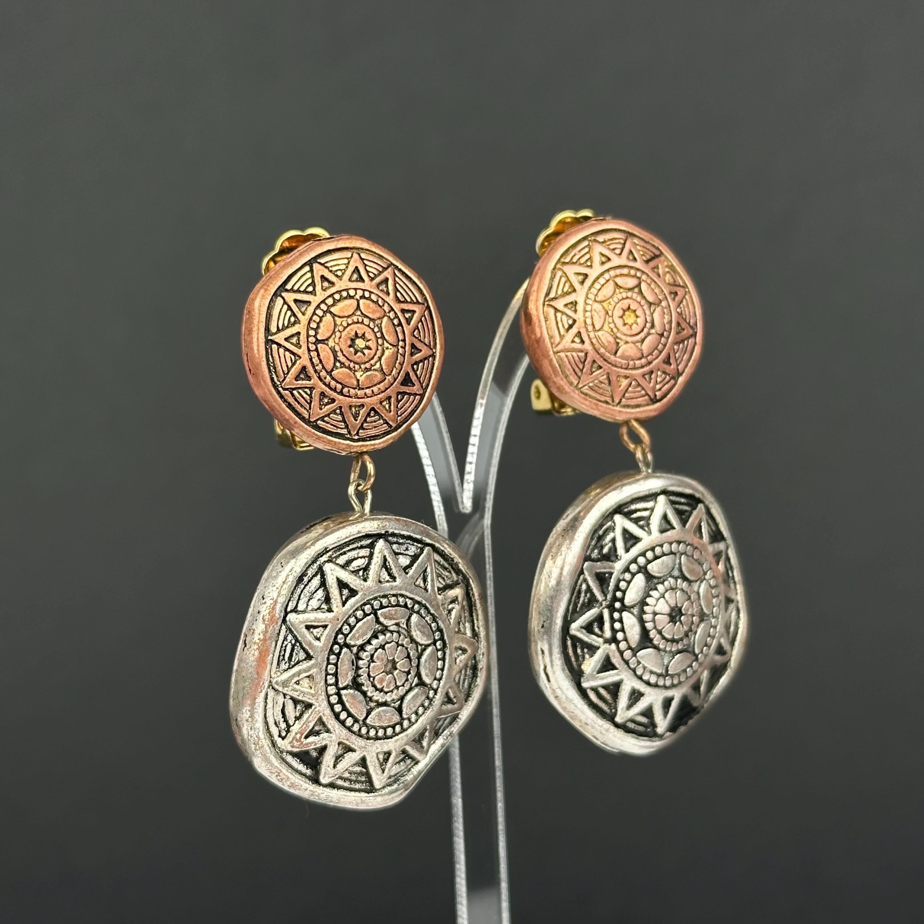Vintage designer clip-on earrings by Mary Demarco