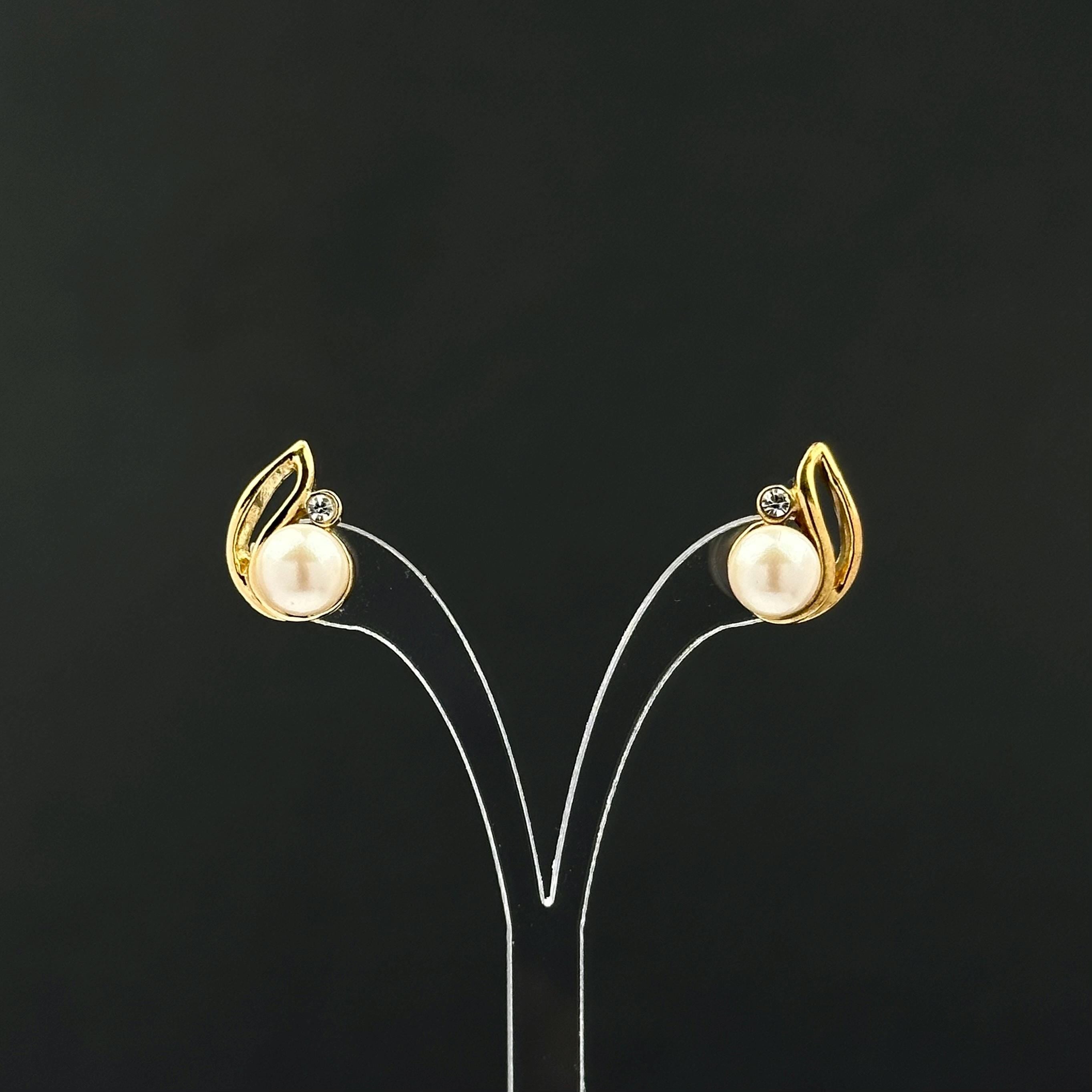 Vintage gold tone and faux pearl leaf earrings