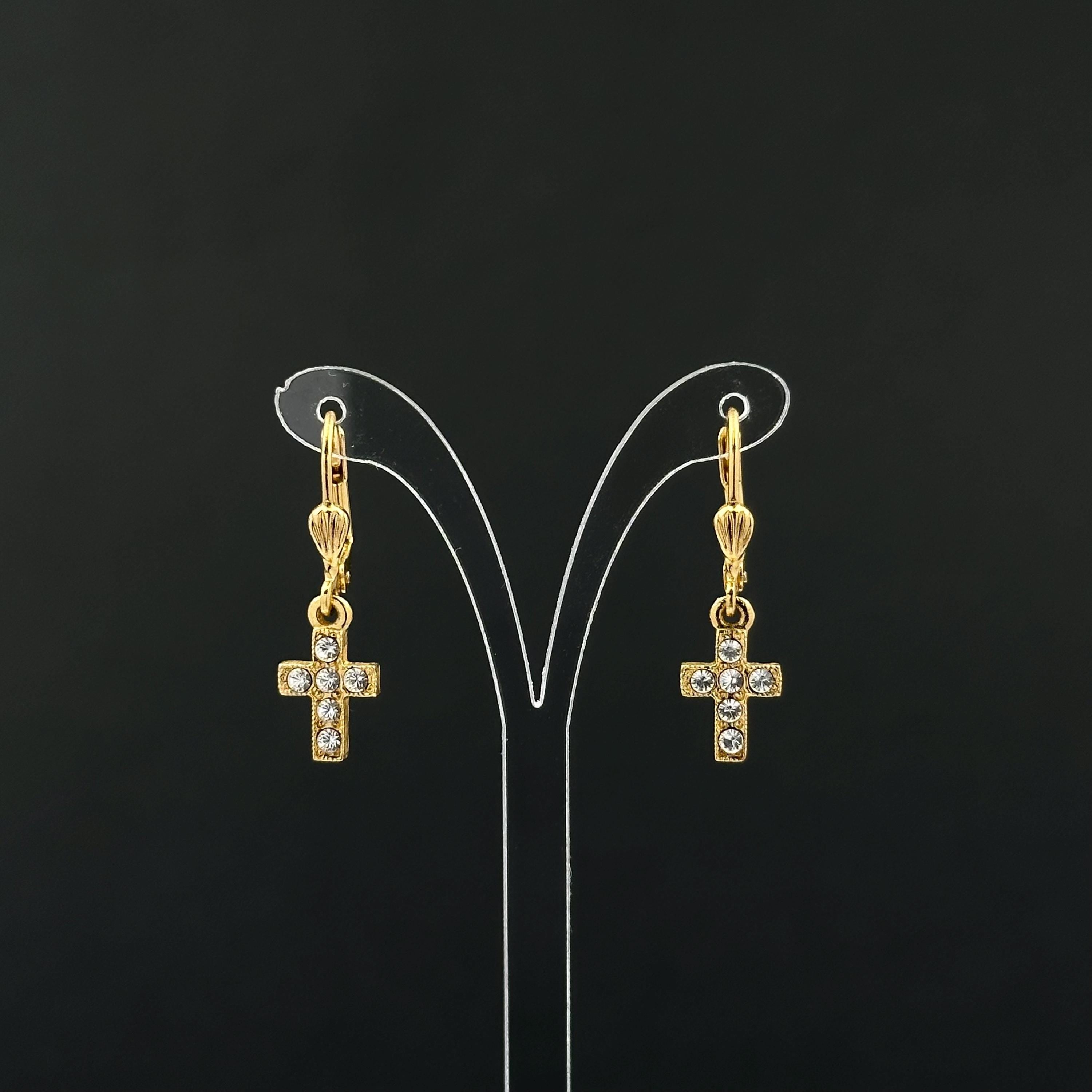 Vintage 1928 gold tone cross drop earrings with clear rhinestones
