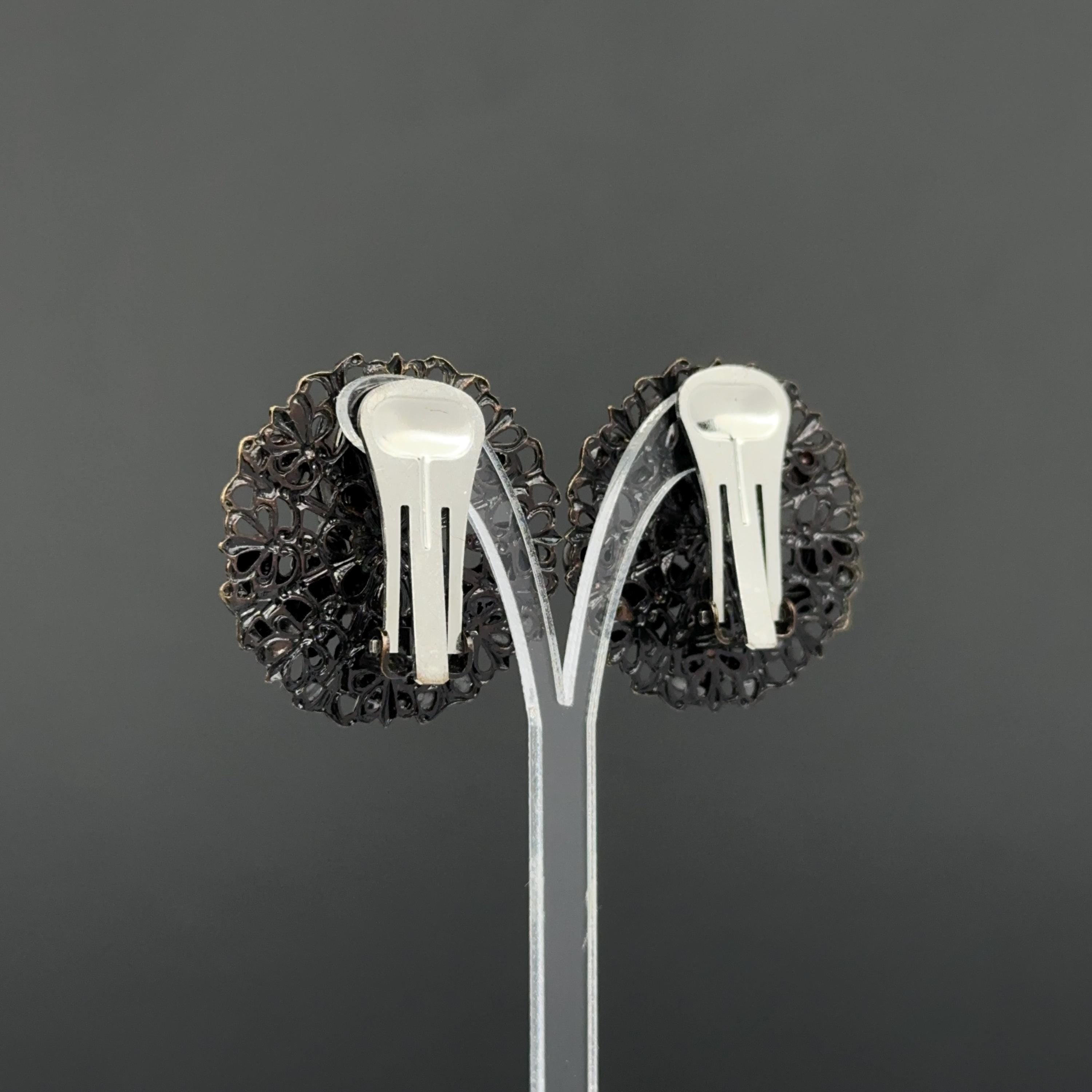 Vintage black filigree clip on earrings