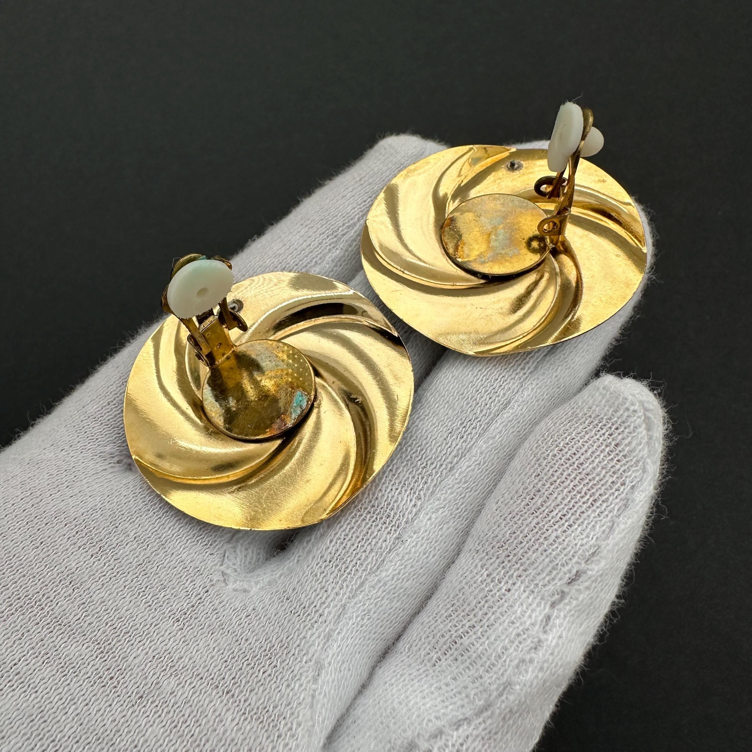 Vintage gold tone and navy blue enamel round clip on earrings