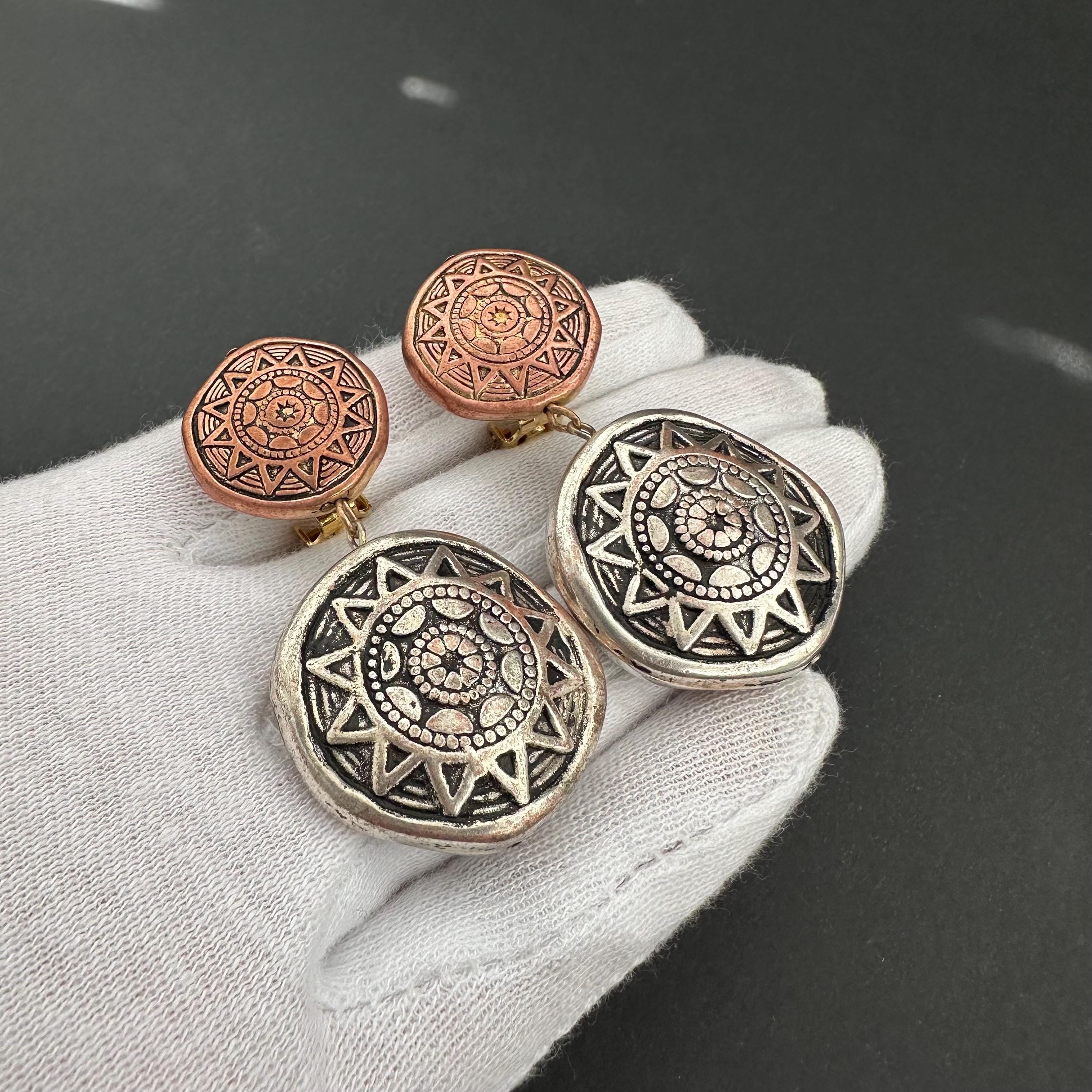 Vintage designer clip-on earrings by Mary Demarco