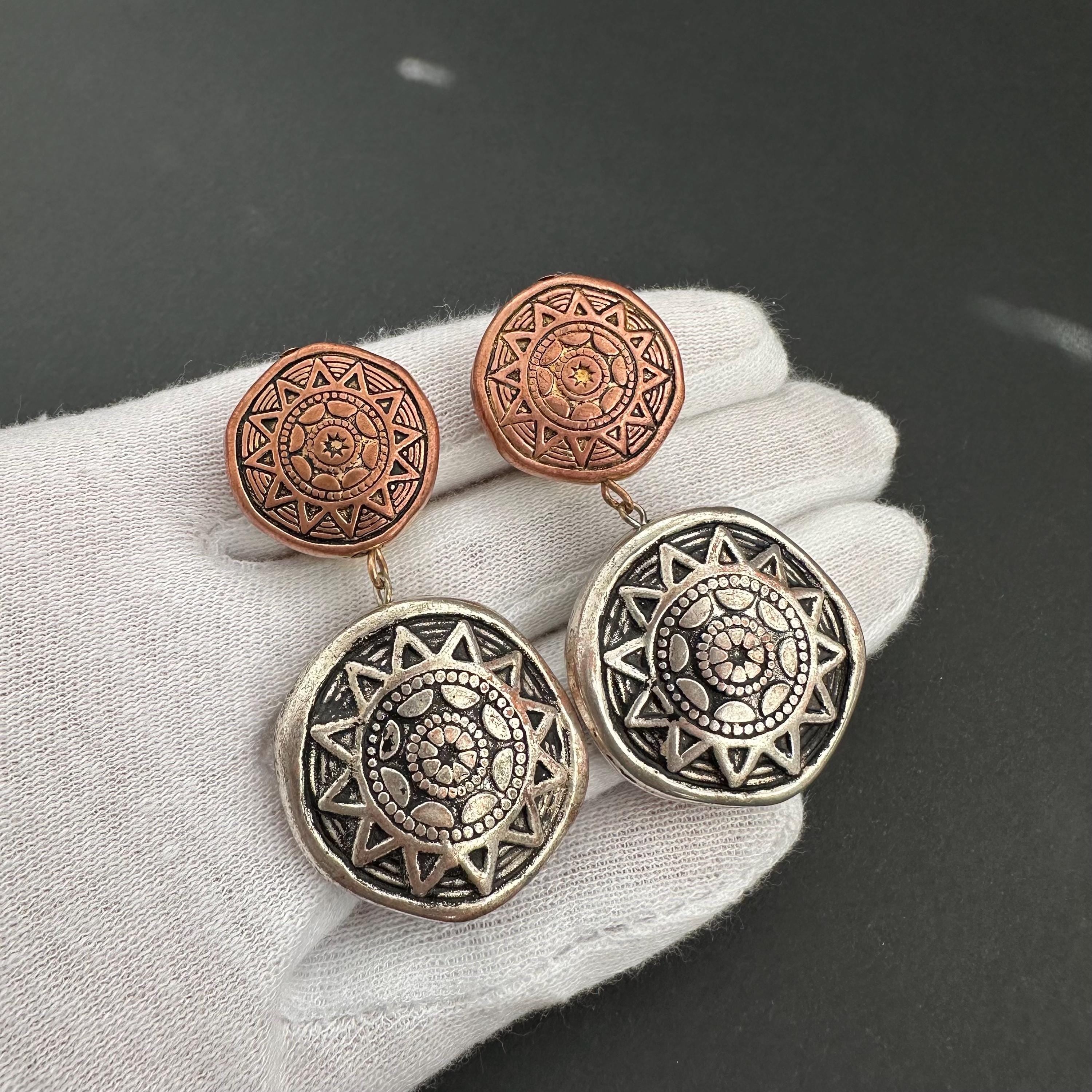 Vintage designer clip-on earrings by Mary Demarco