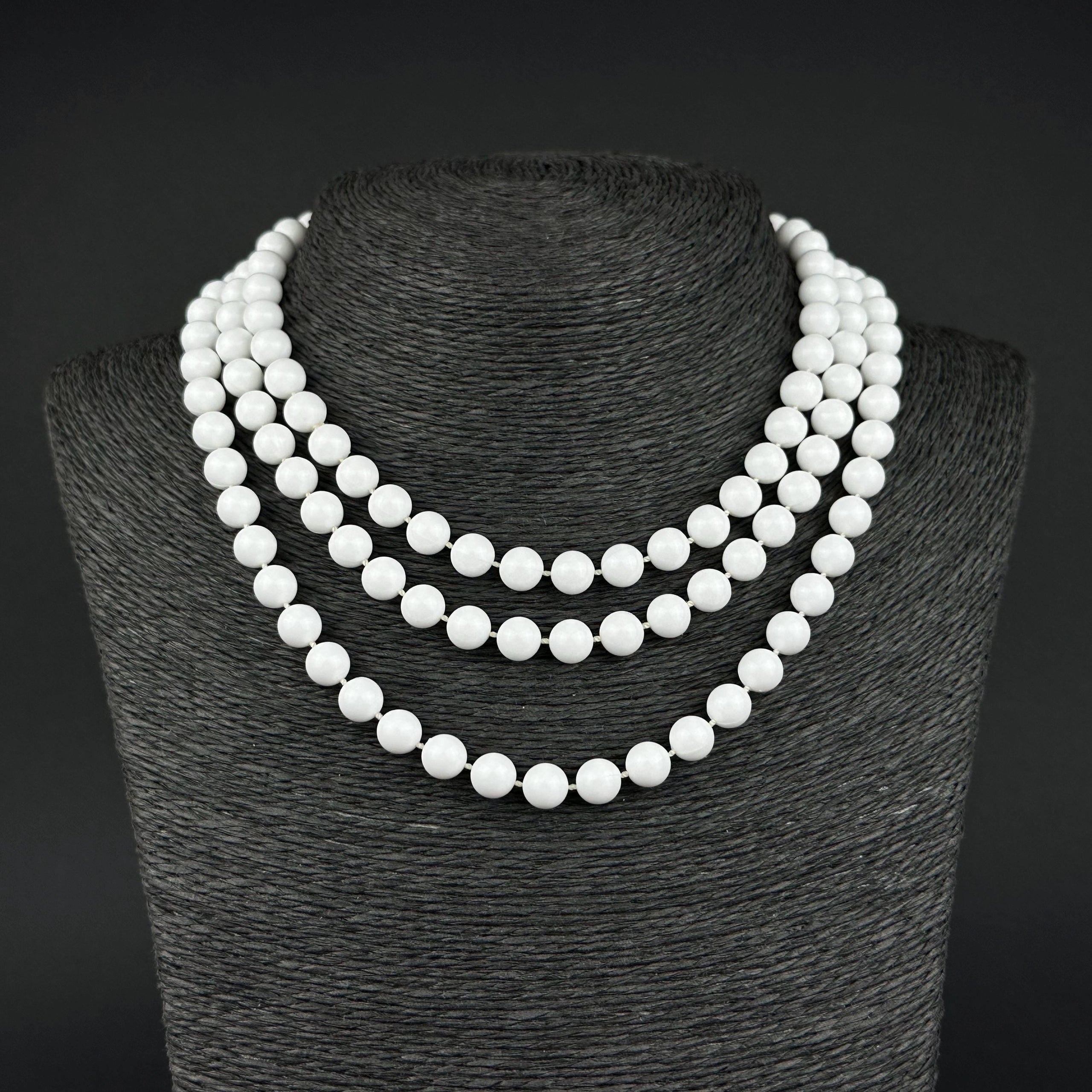 Vintage long white plastic bead necklace