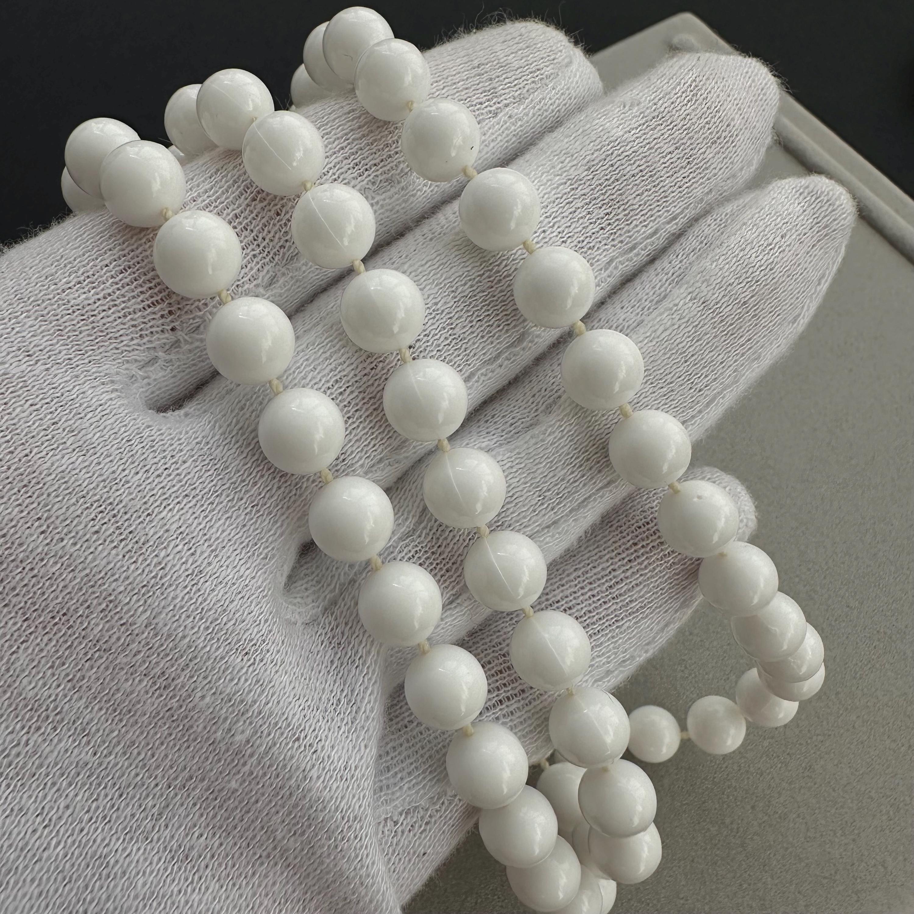 Vintage long white plastic bead necklace