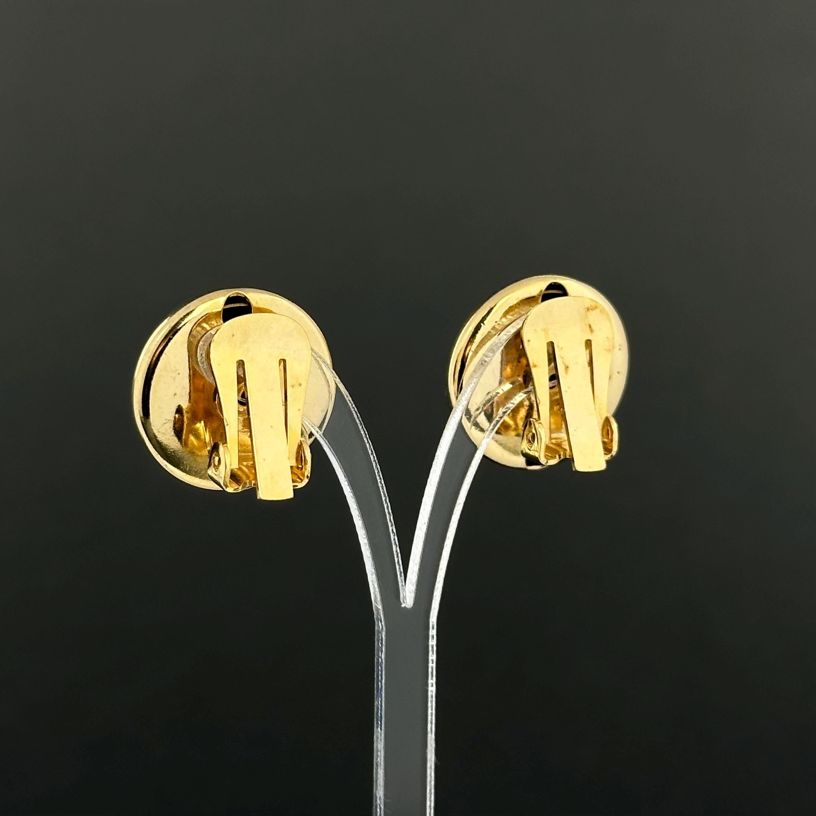 Vintage gold tone round dome clip on earrings