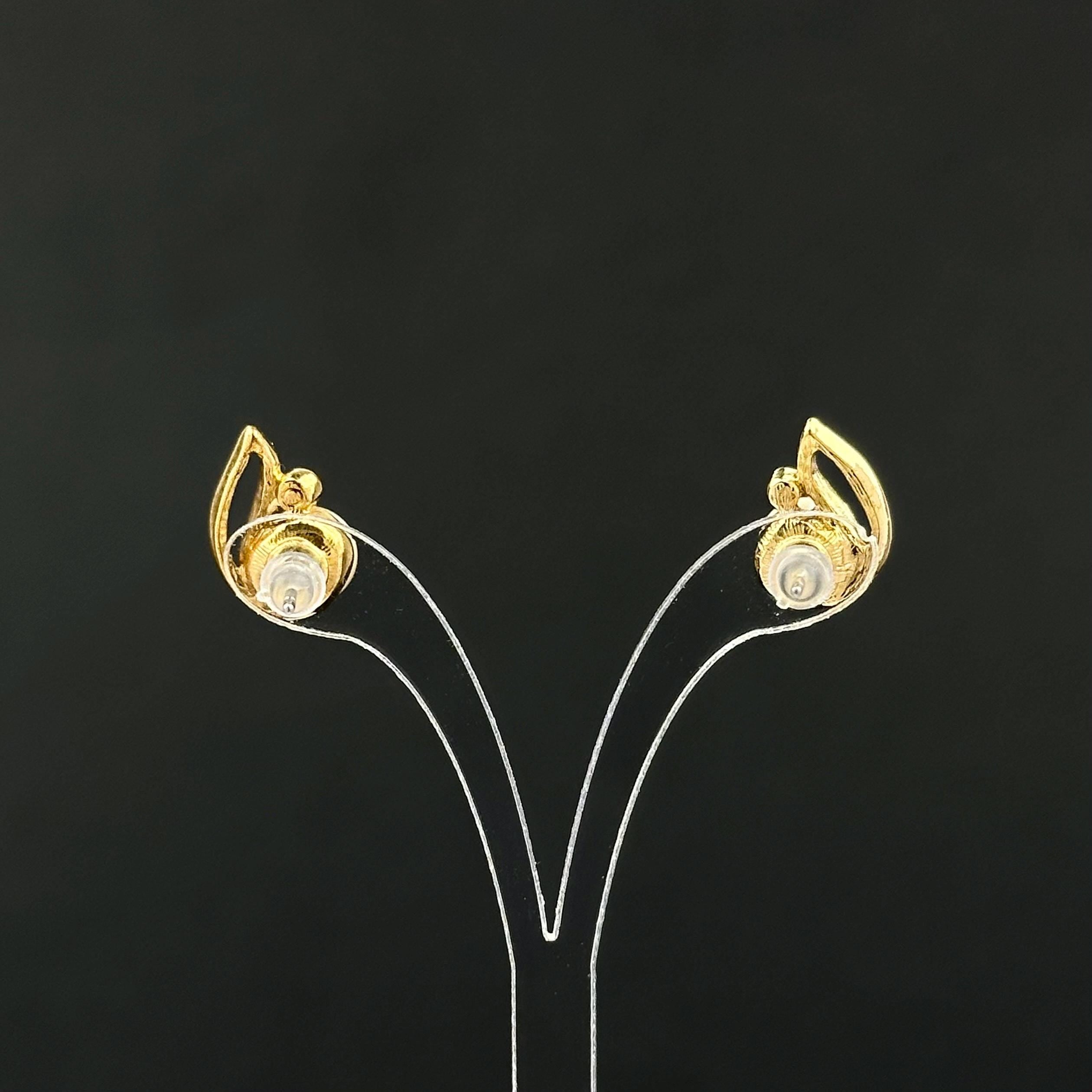 Vintage gold tone and faux pearl leaf earrings