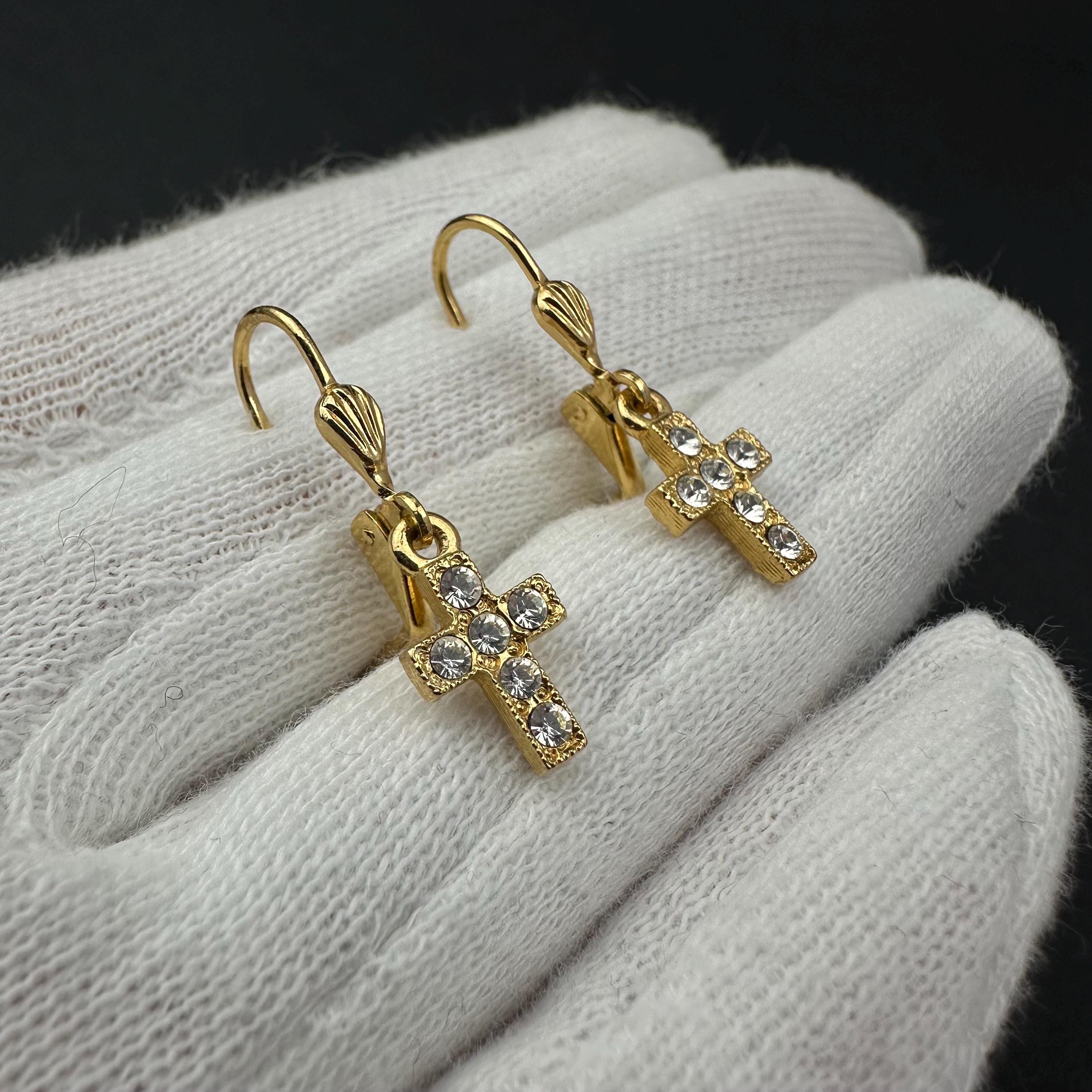 Vintage 1928 gold tone cross drop earrings with clear rhinestones