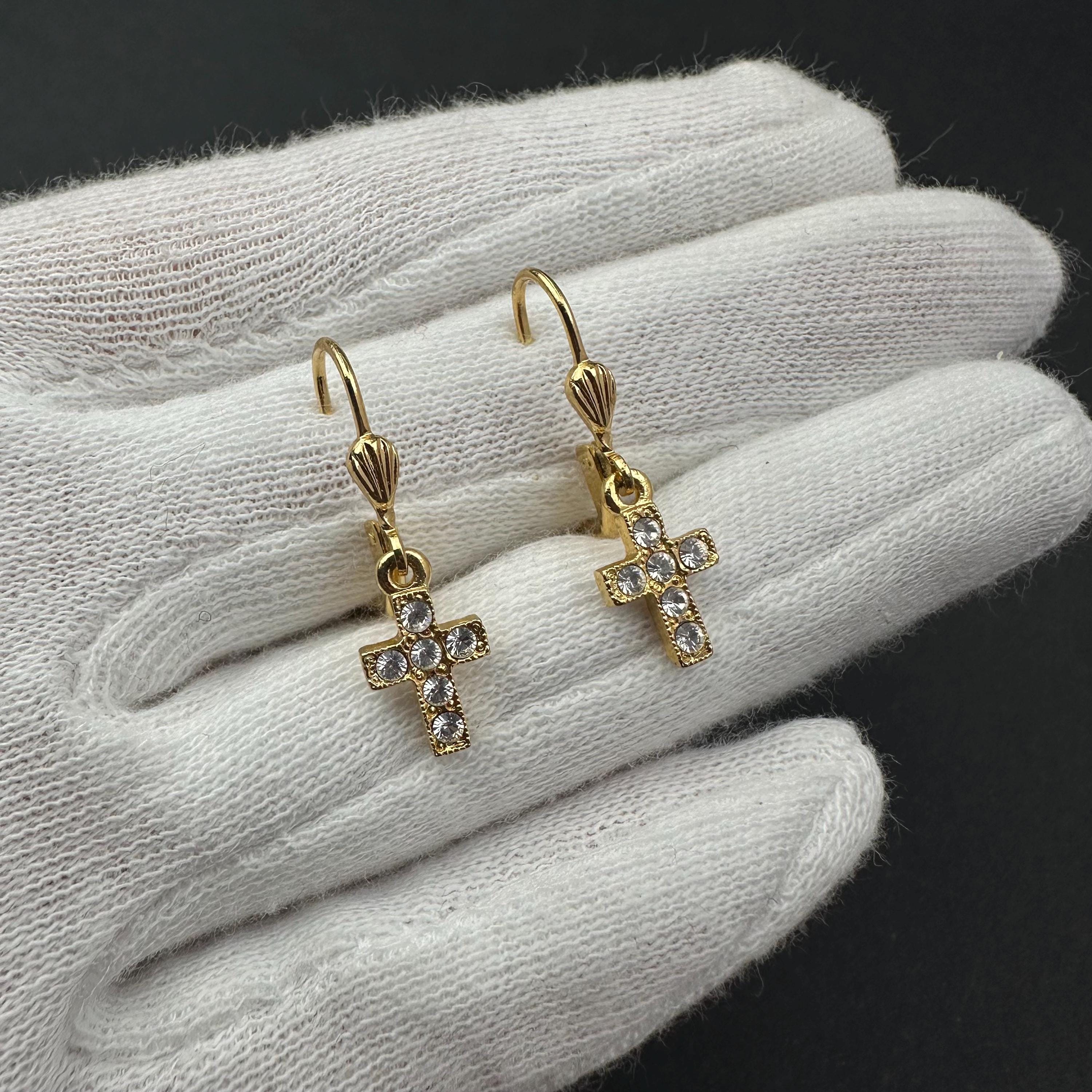 Vintage 1928 gold tone cross drop earrings with clear rhinestones