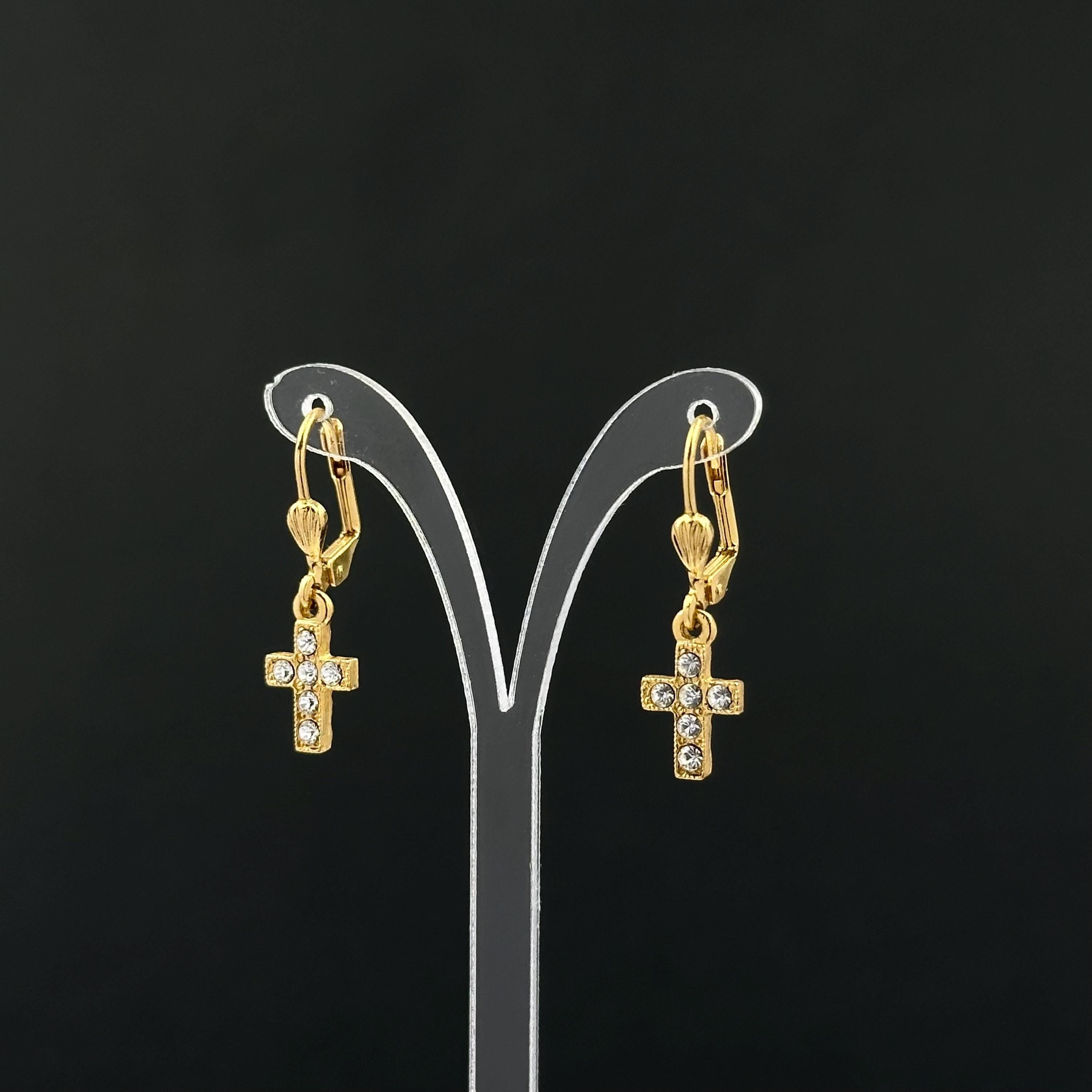 Vintage 1928 gold tone cross drop earrings with clear rhinestones
