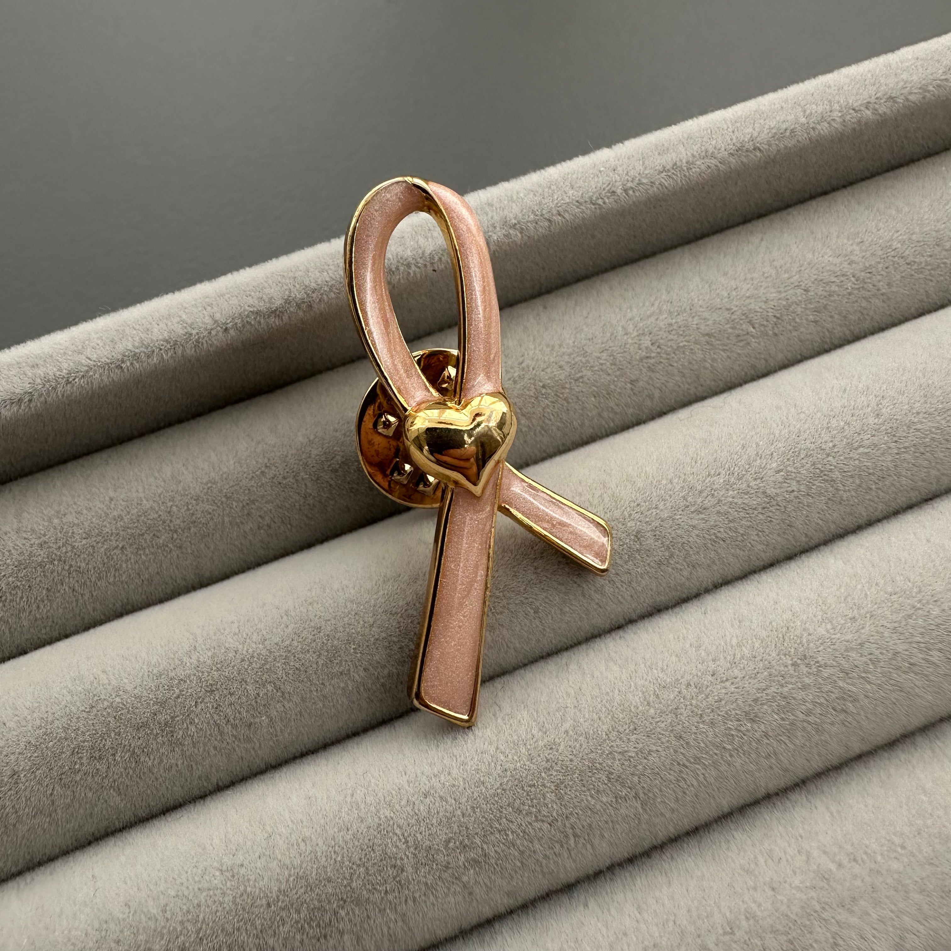 Vintage AVON gold tone and pink enamel ribbon heart lapel pin