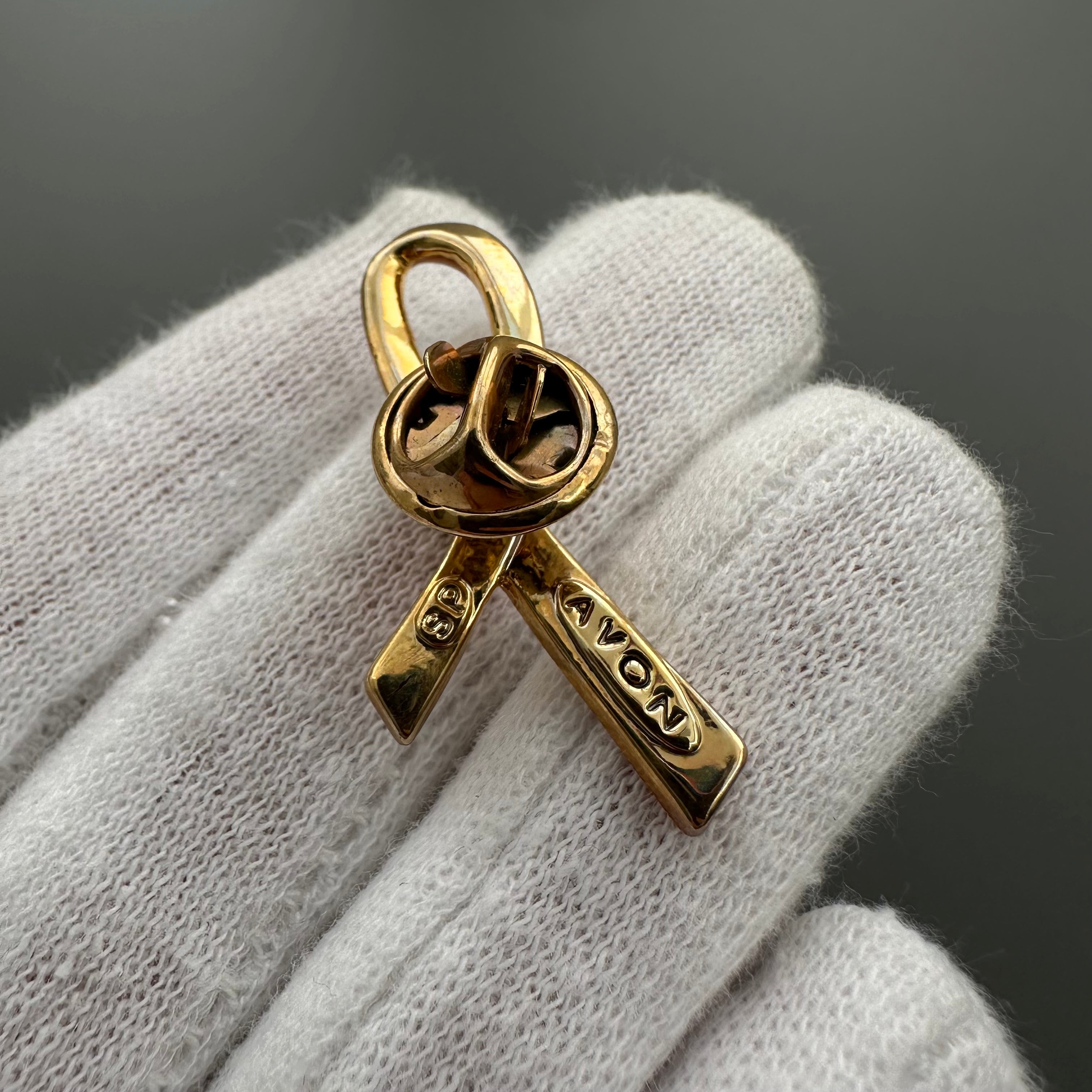 Vintage AVON gold tone and pink enamel ribbon heart lapel pin