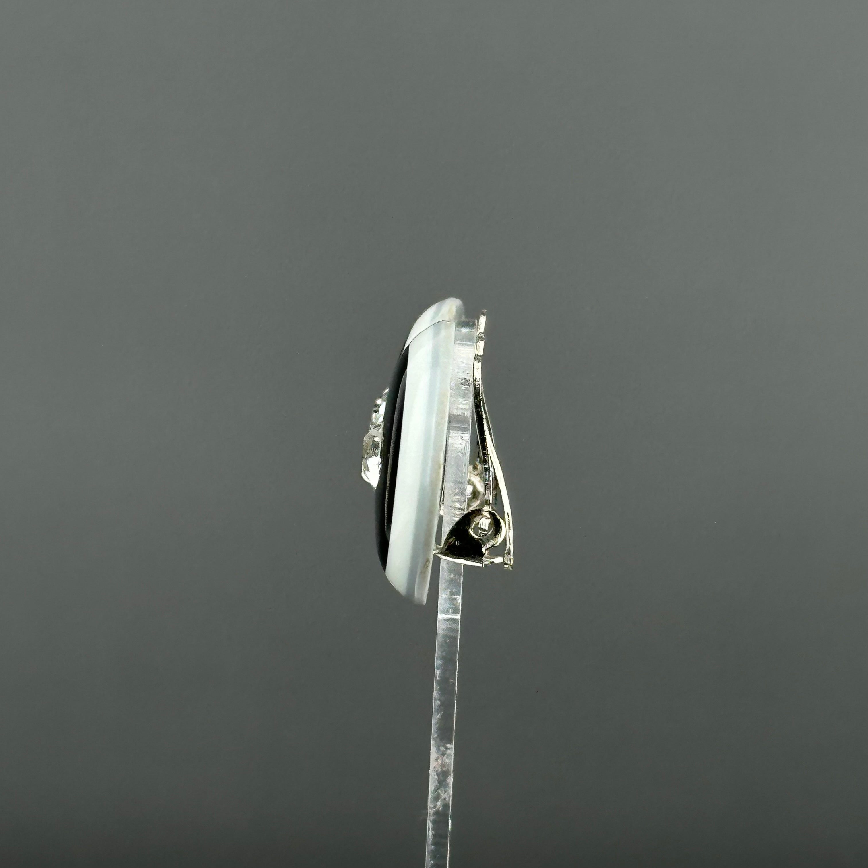 Vintage grey & black plastic round clip on earrings with clear crystal