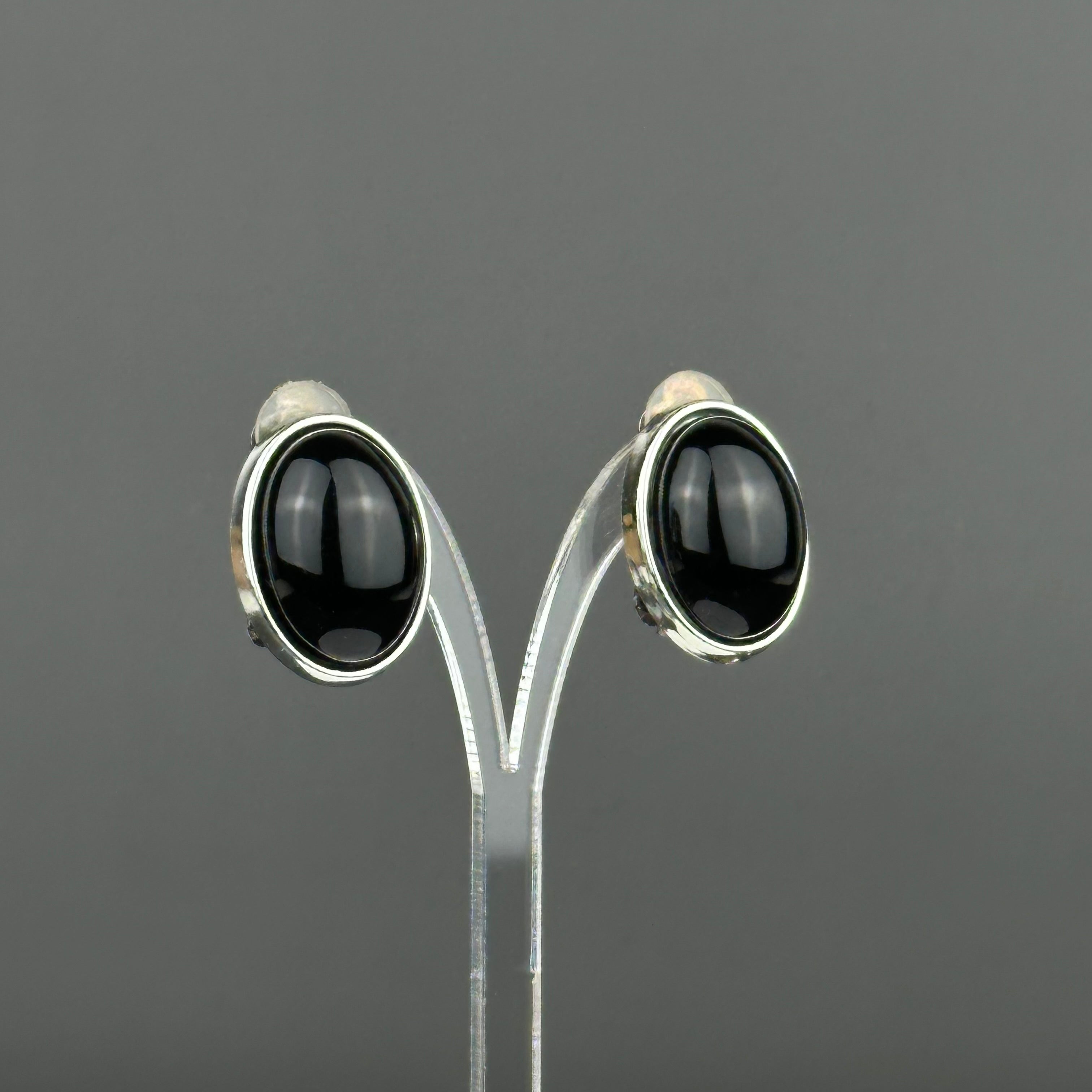 Vintage silver tone and black oval clip on earrings