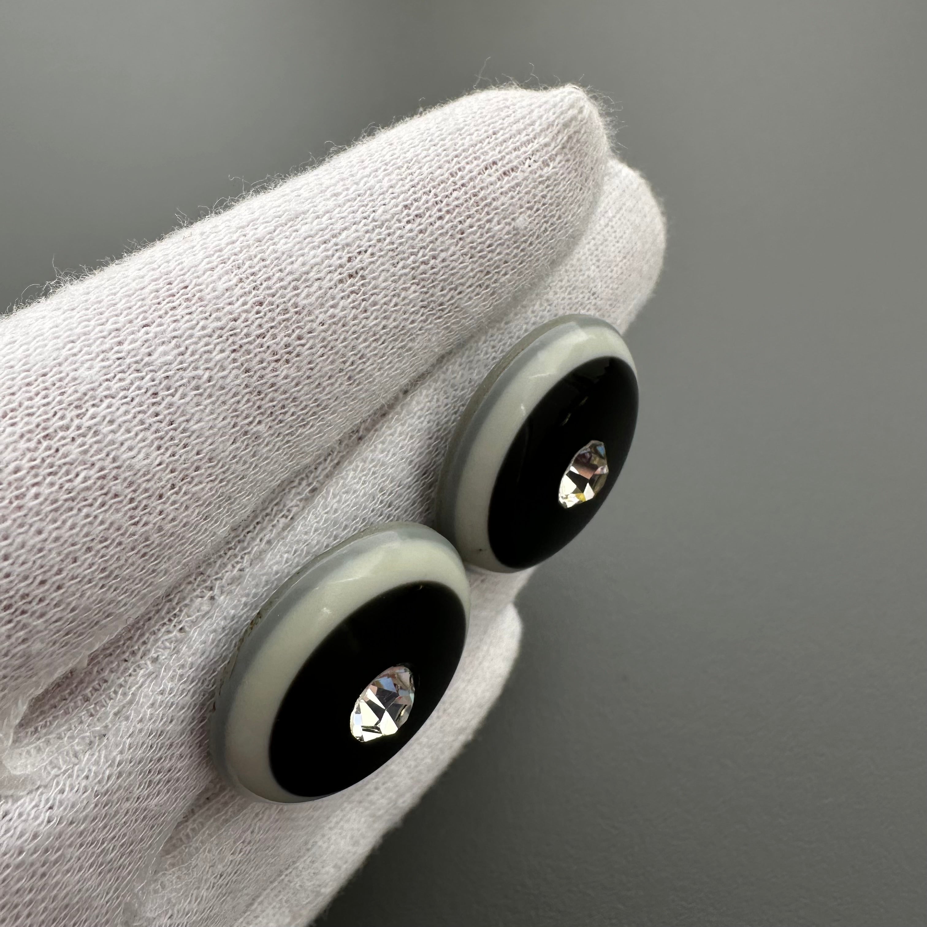 Vintage grey & black plastic round clip on earrings with clear crystal