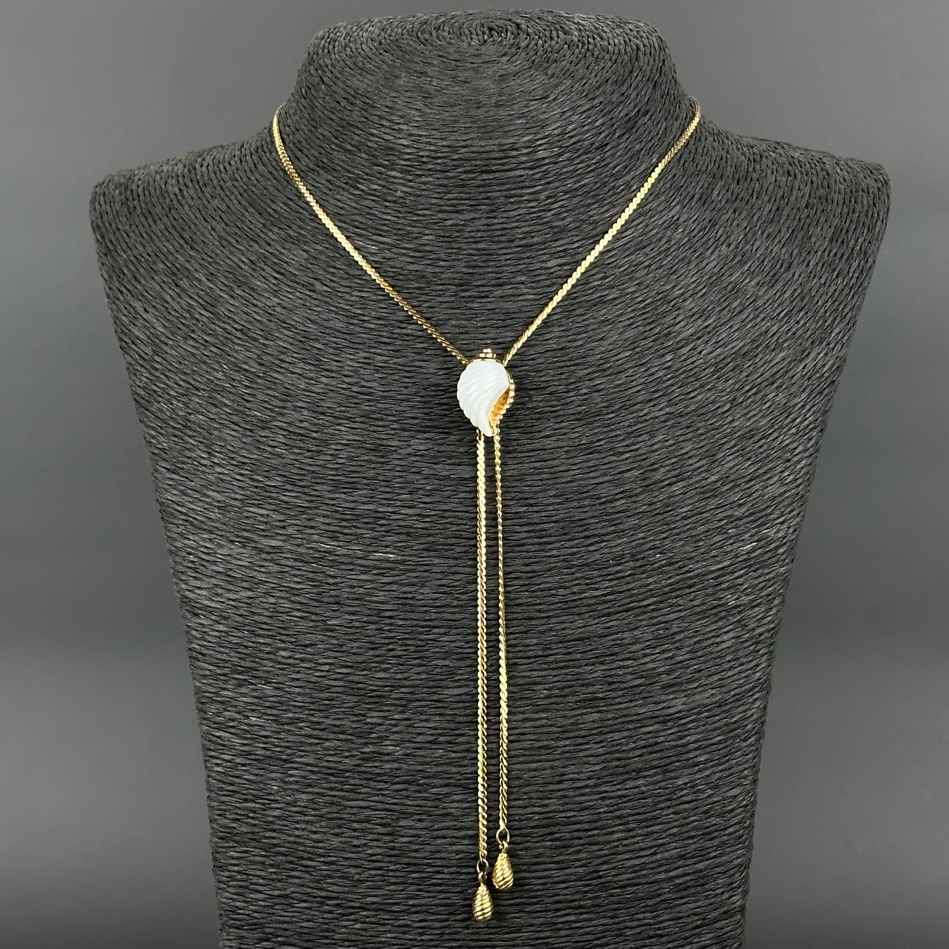 intage AVON gold tone sliding lariat necklace with white shell pendant