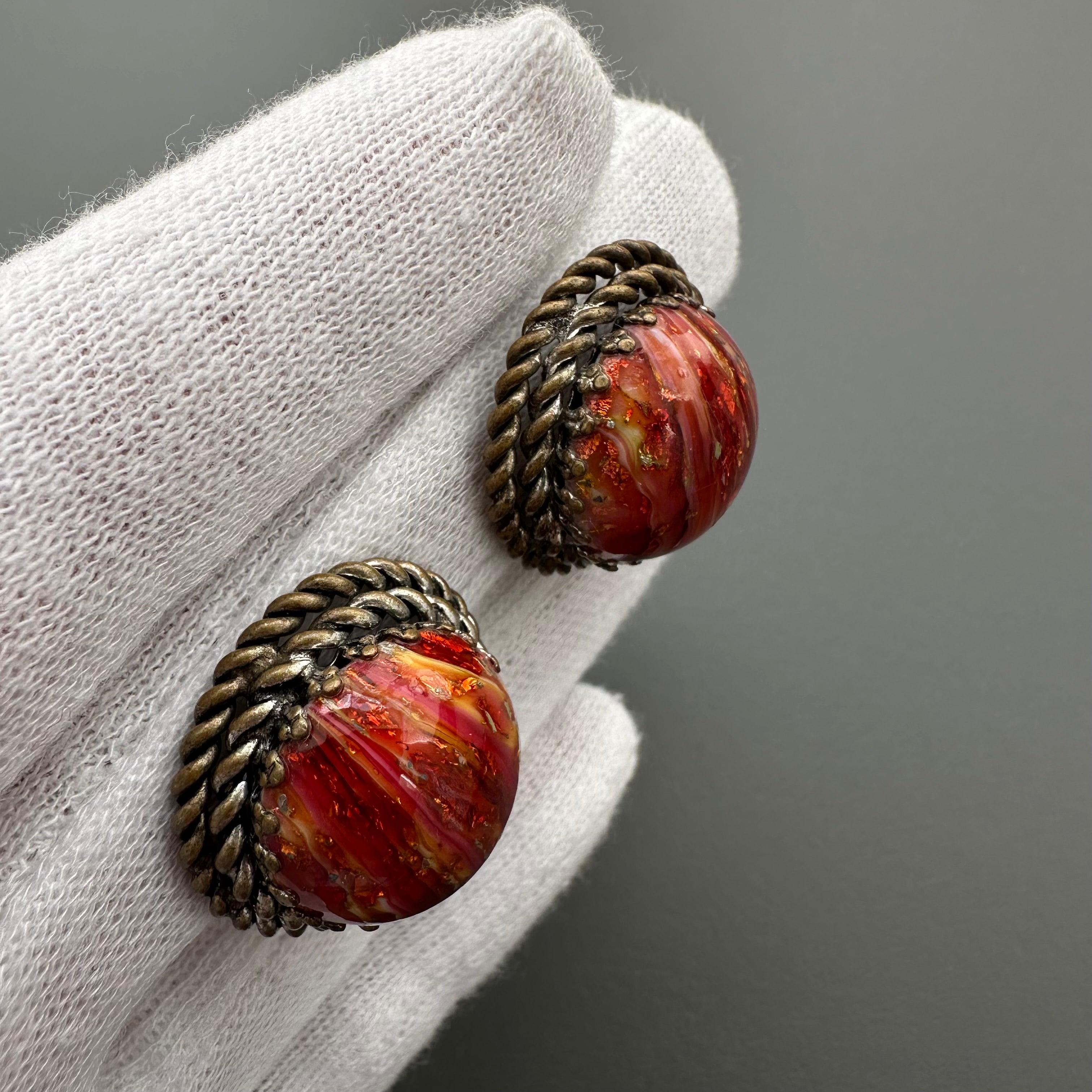 Vintage bronze tone and red art glass round clip-on earrings