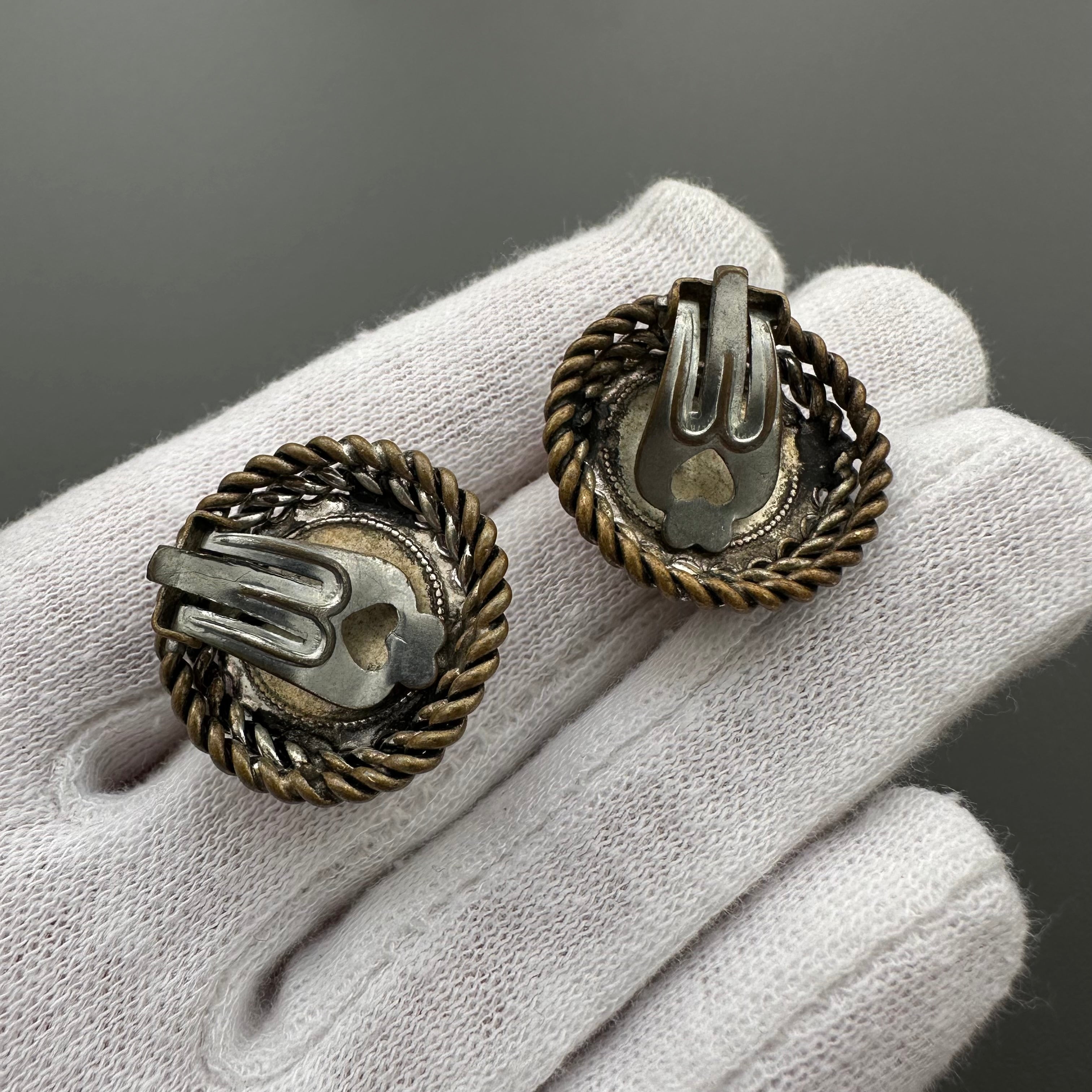 Vintage bronze tone and red art glass round clip-on earrings