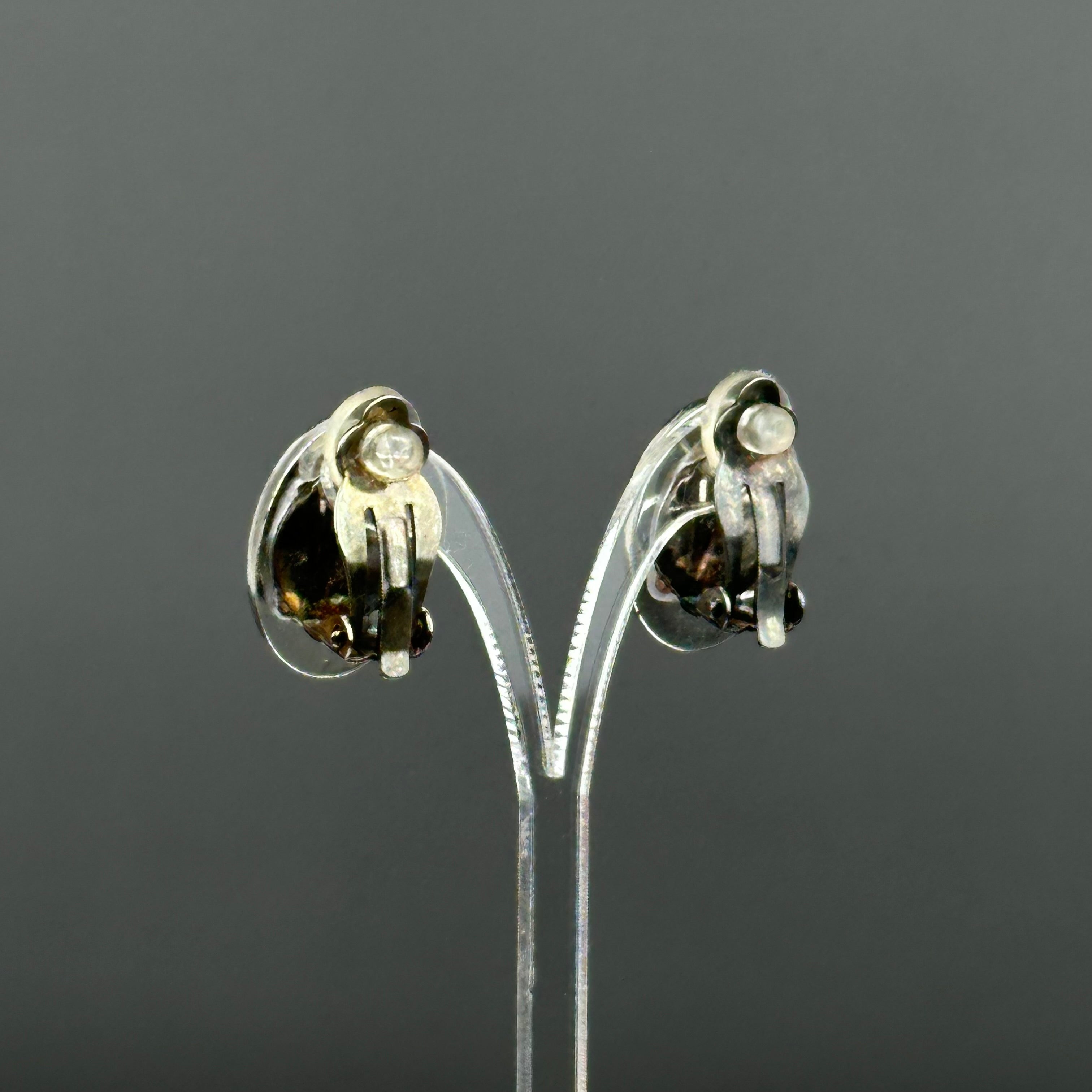 Vintage silver tone and black oval clip on earrings