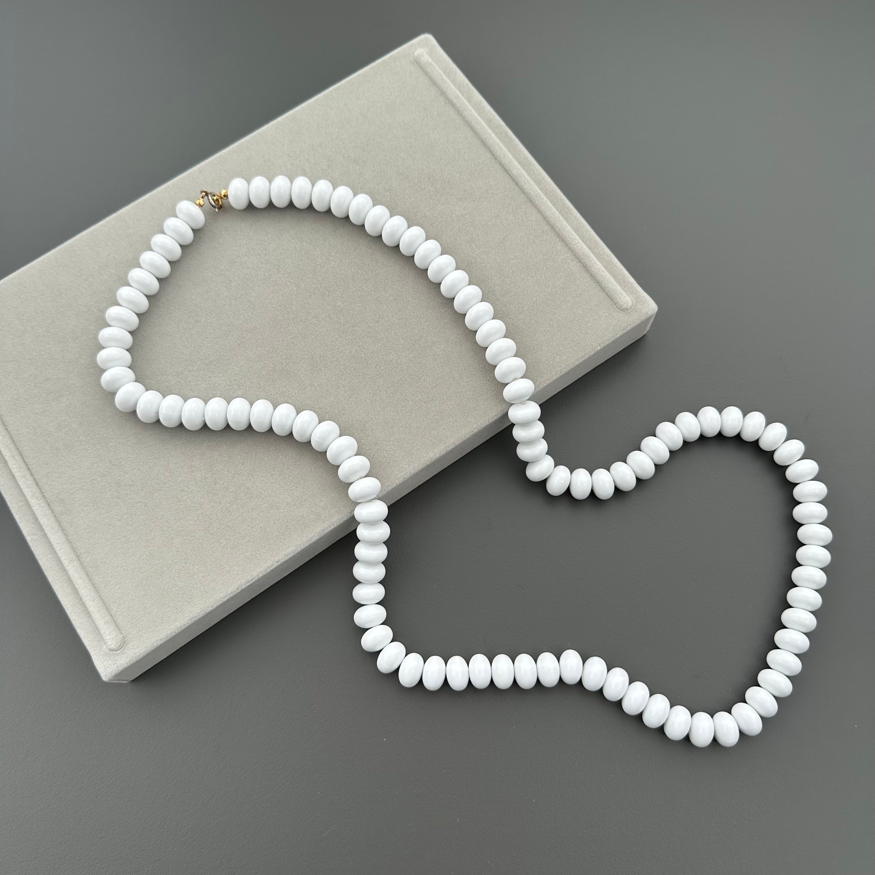 Vintage long white plastic bead necklace