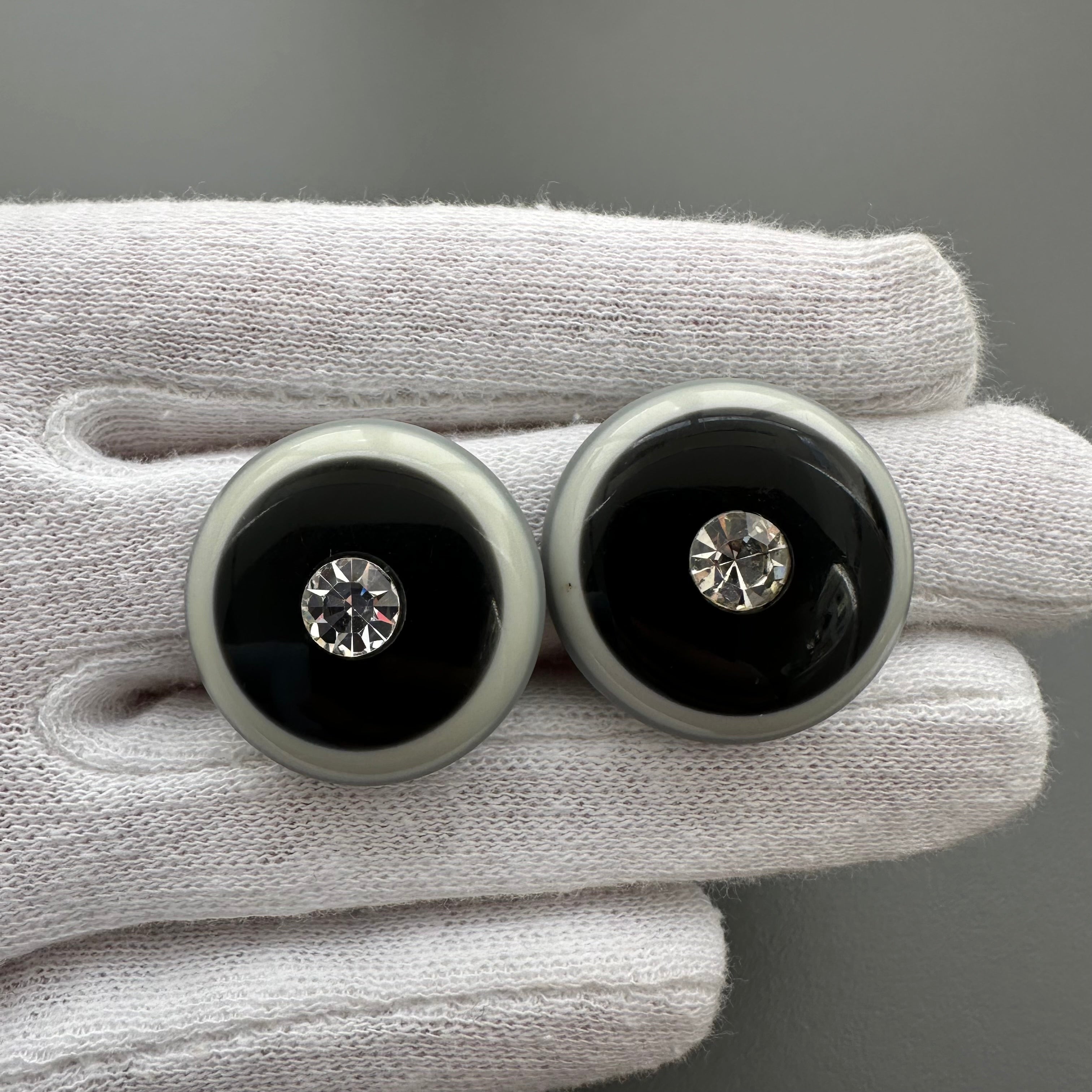 Vintage grey & black plastic round clip on earrings with clear crystal
