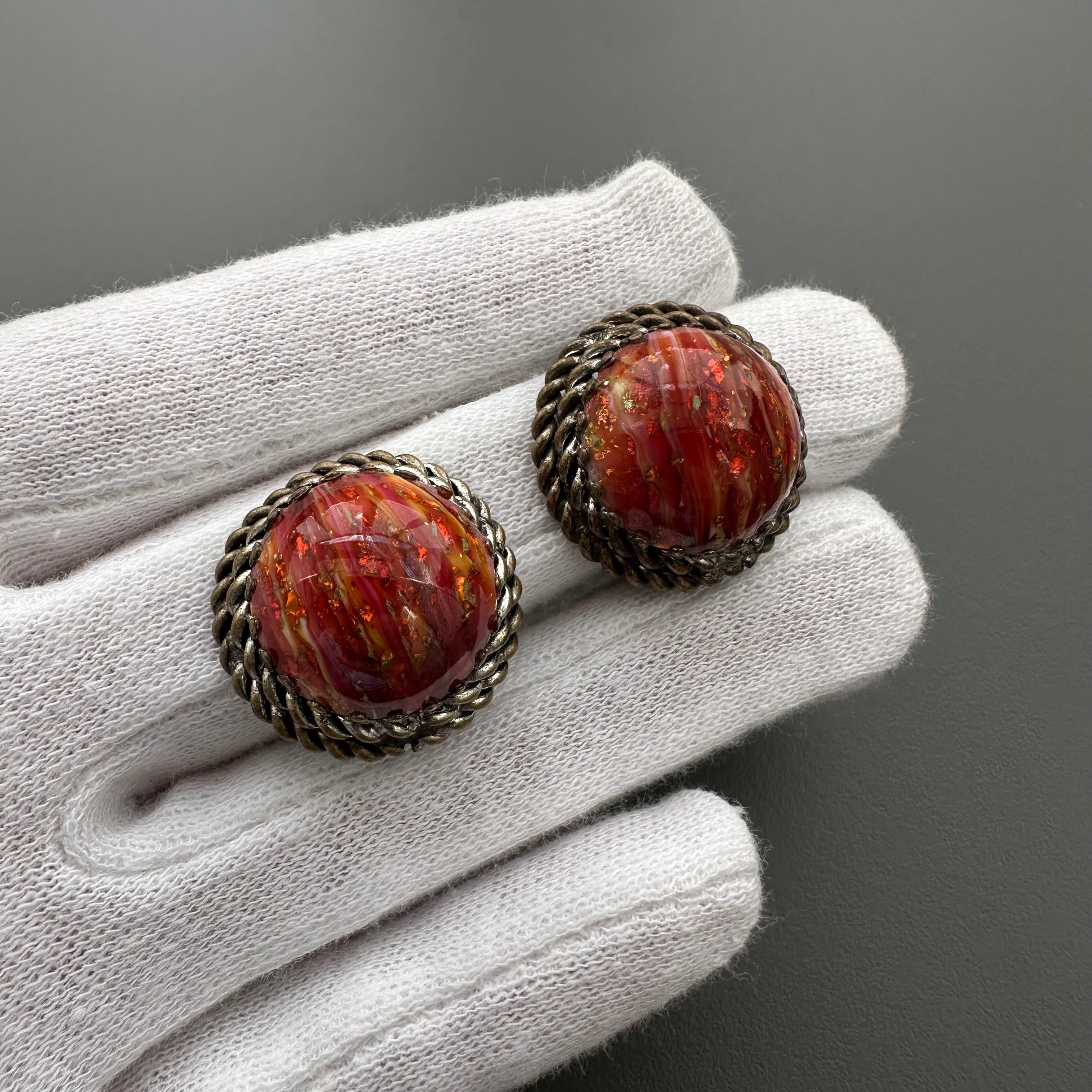 Vintage bronze tone and red art glass round clip-on earrings