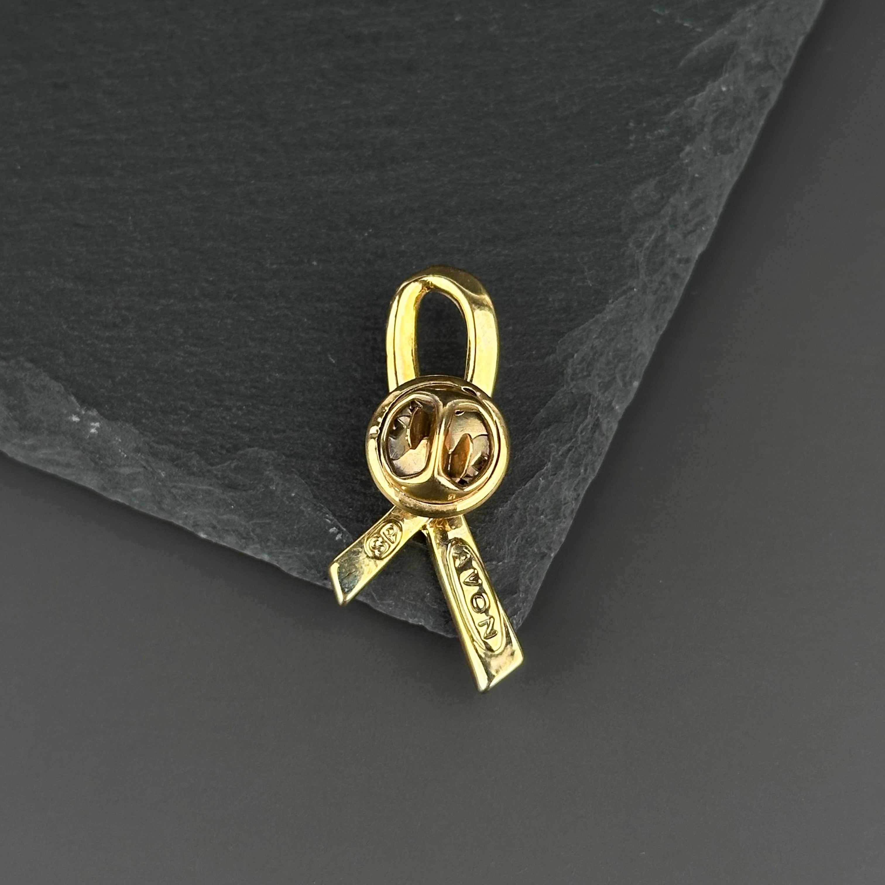 Vintage AVON gold tone and pink enamel ribbon heart lapel pin