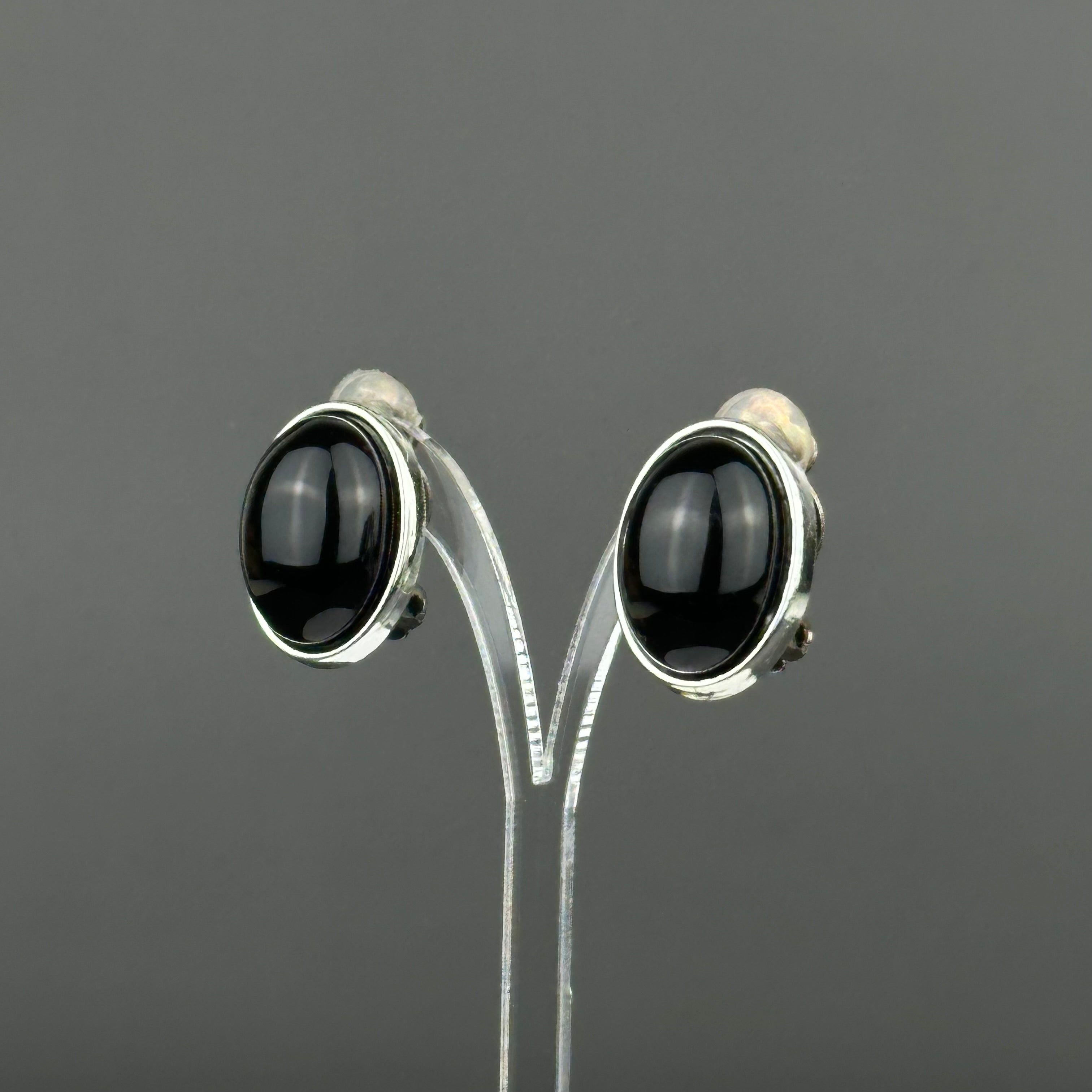 Vintage silver tone and black oval clip on earrings