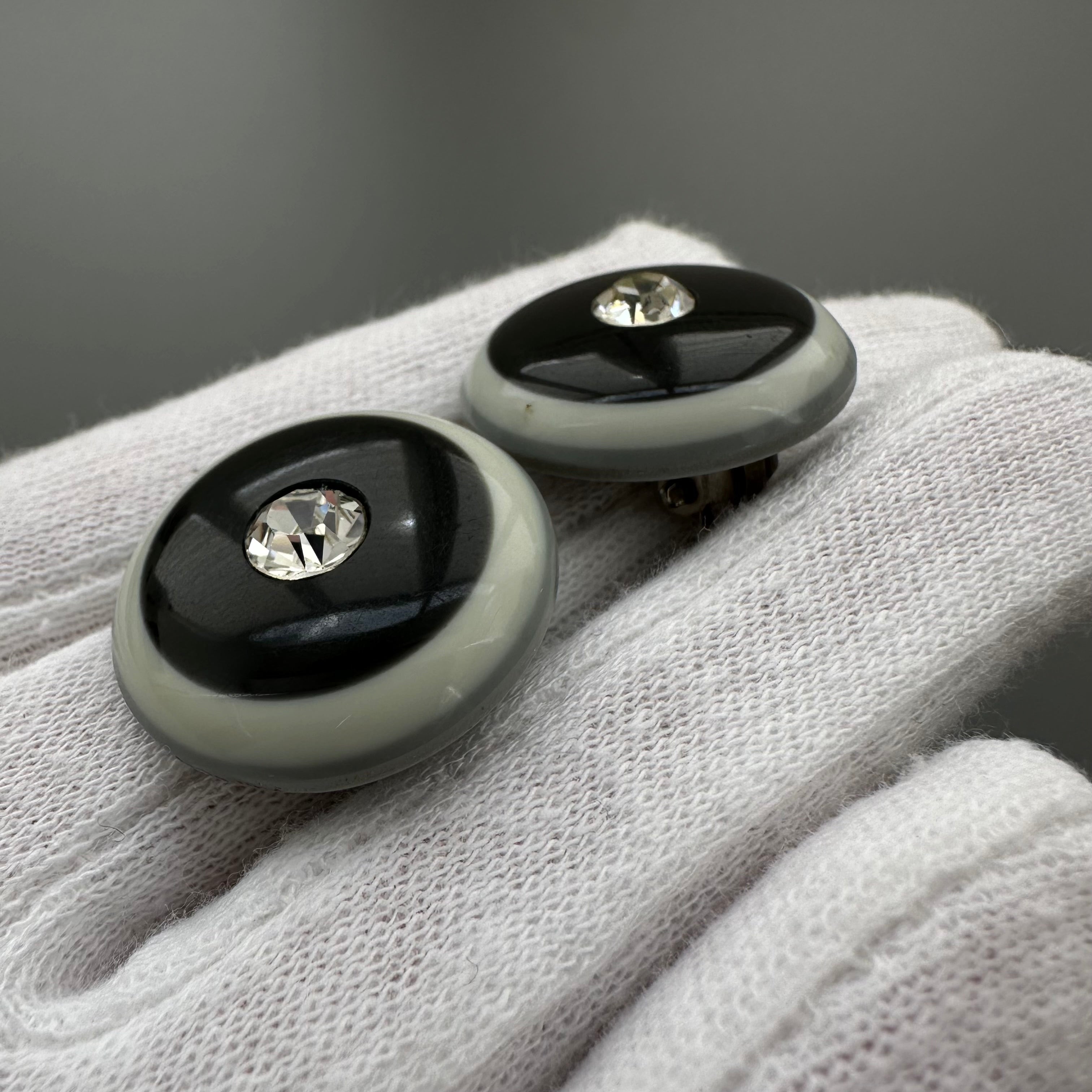 Vintage grey & black plastic round clip on earrings with clear crystal