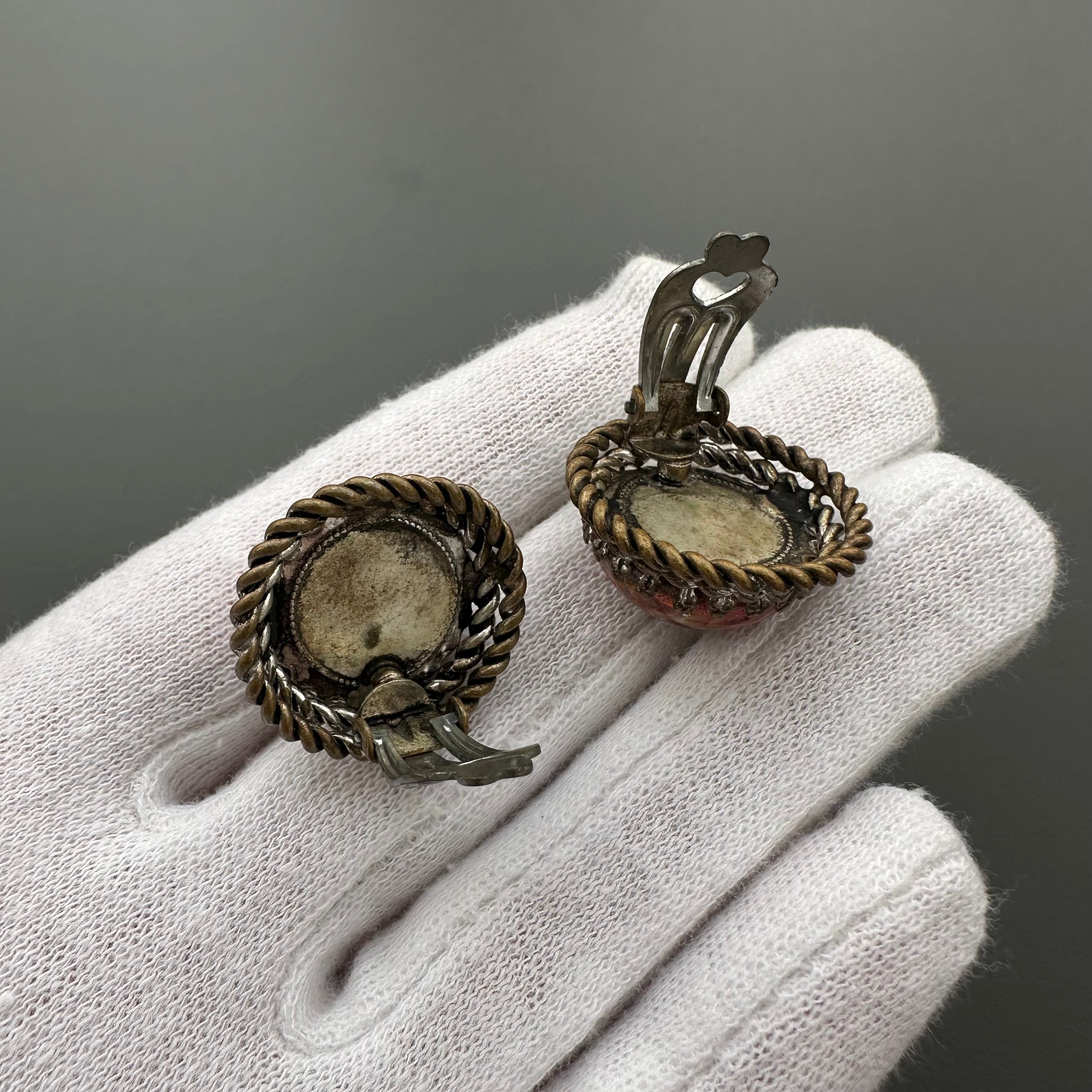 Vintage bronze tone and red art glass round clip-on earrings