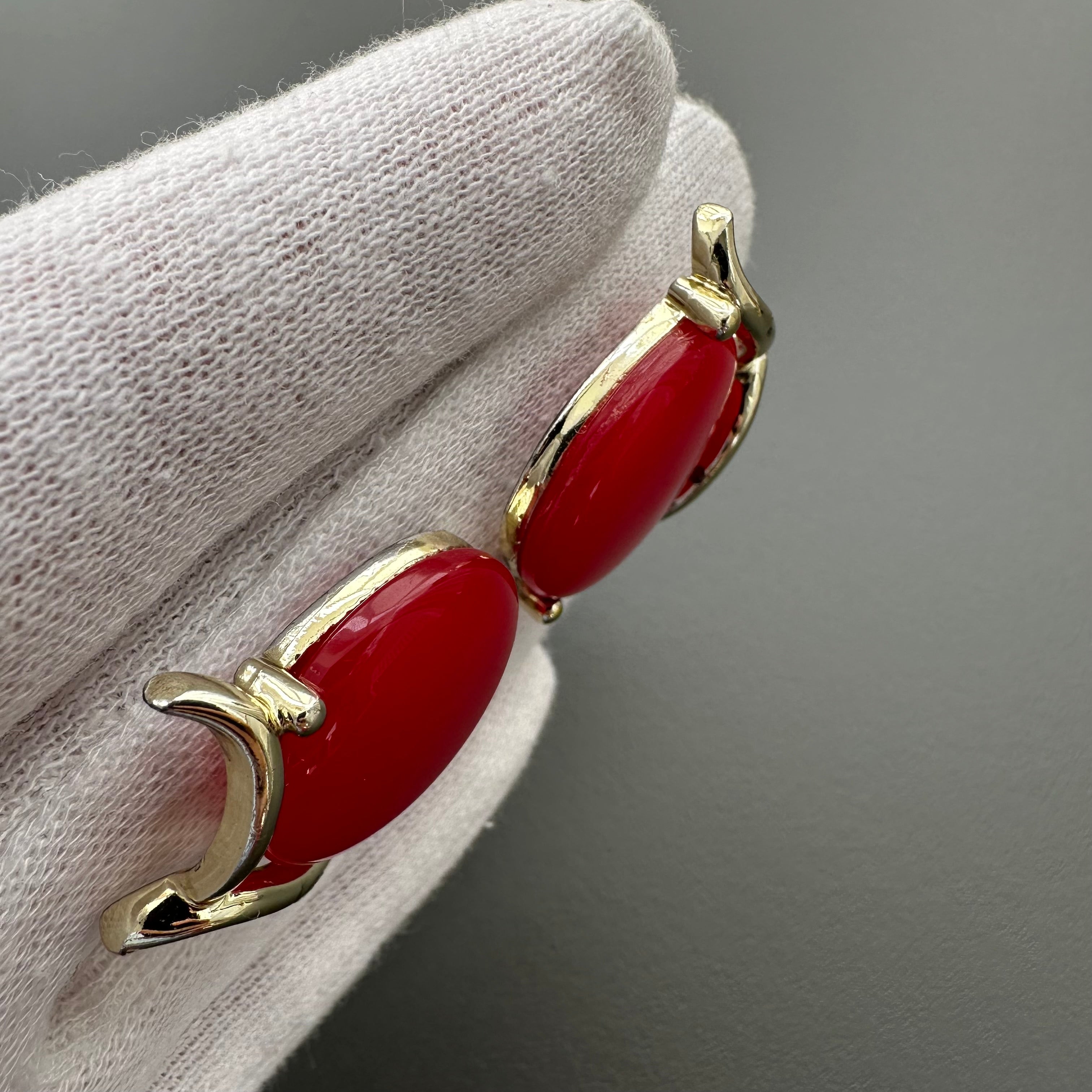 Vintage gold-tone and red lucite clip-on earrings