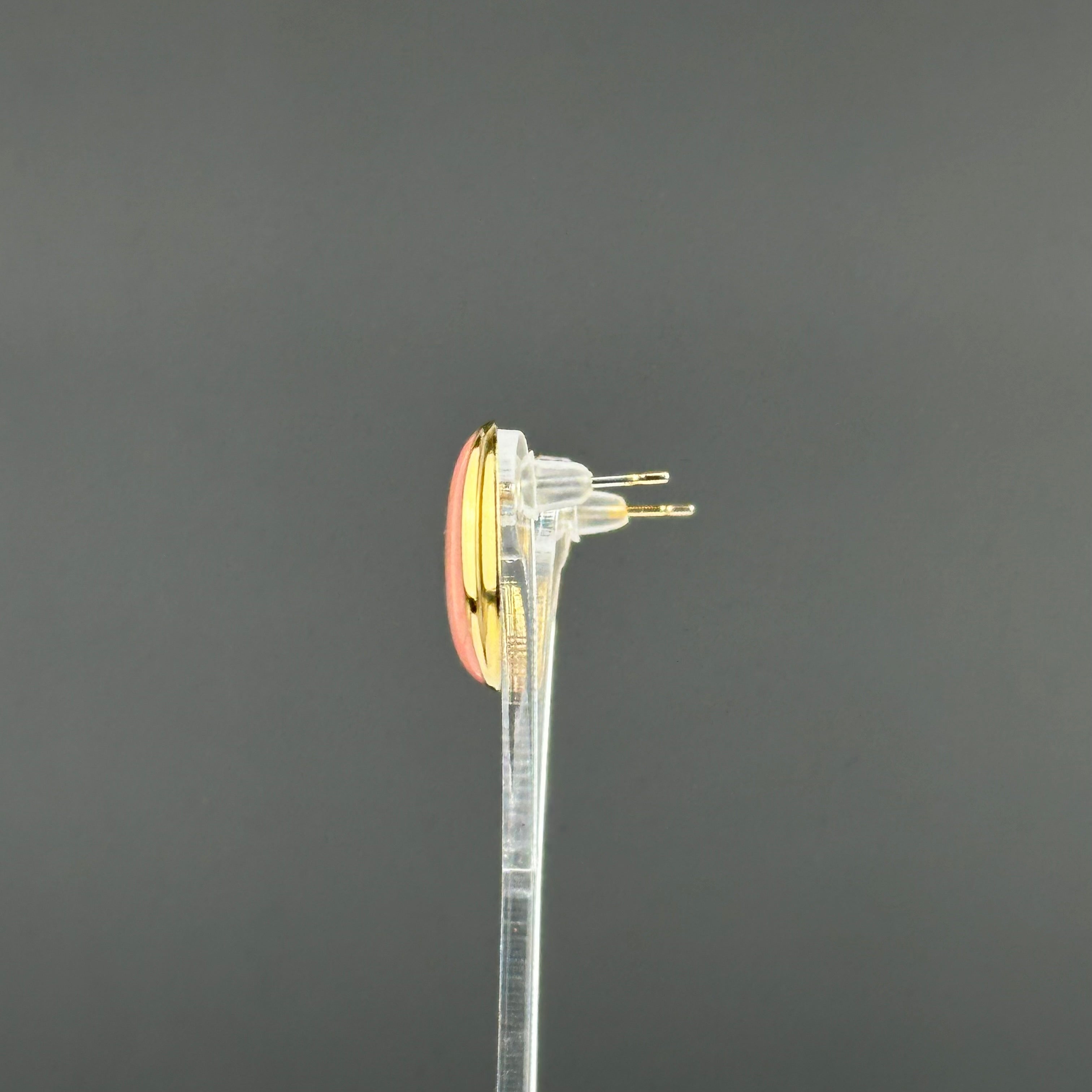 Vintage gold tone and pink enamel oval stud earrings